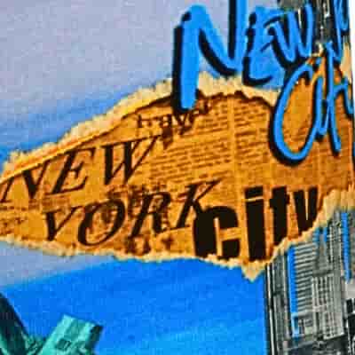 New York City sign with buildings in the background