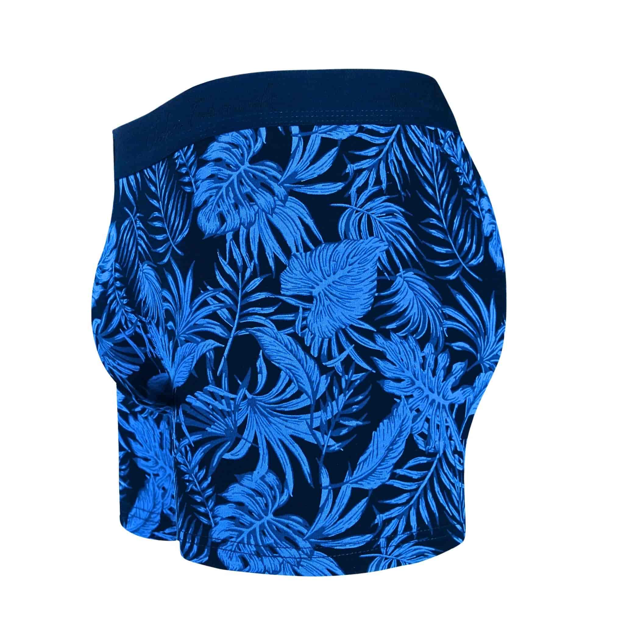 Side view of men’s 95% cotton boxer brief in navy with bright blue palm print, contoured pouch, and tailored leg cut