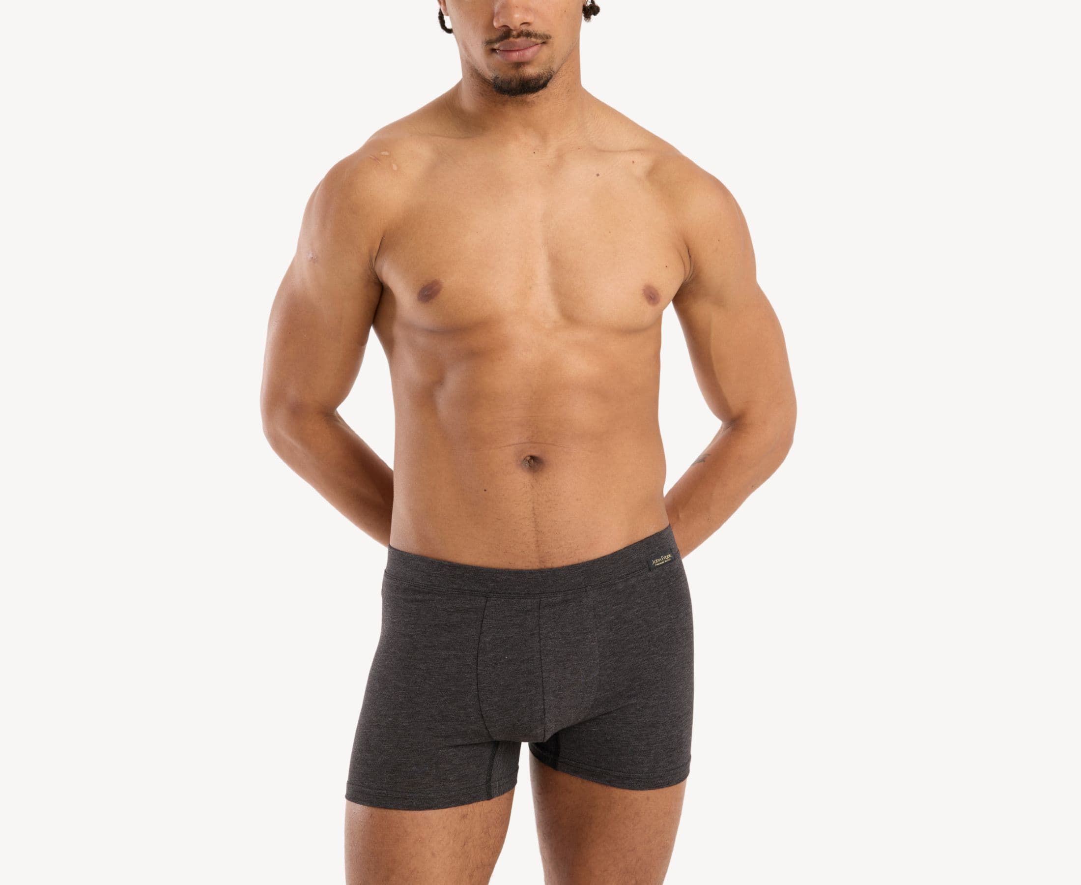 Front view of model wearing men’s 95% cotton boxer brief in slate gray with fabric-covered waistband, invisible seams and soft stretch