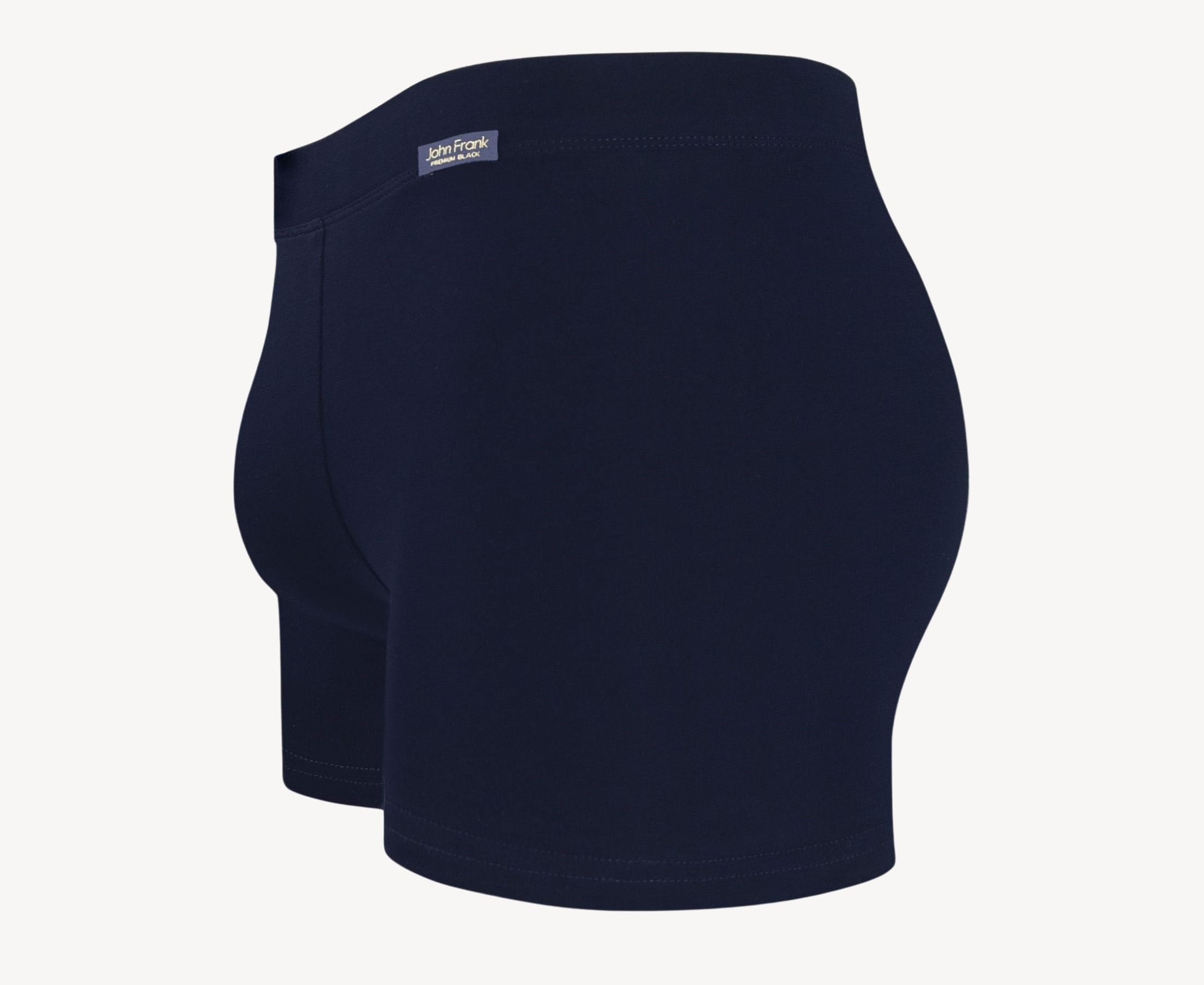 Side view of men’s 95% cotton boxer brief in navy with fabric-covered waistband, contoured pouch, and tailored leg cut