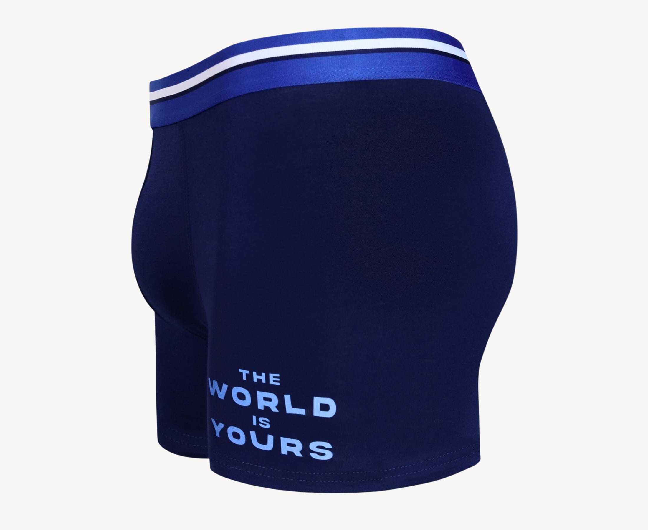 Side view of men’s 95% micromodal boxer brief in indigo blue with "The World Is Yours" print, contoured pouch, and tailored leg cut