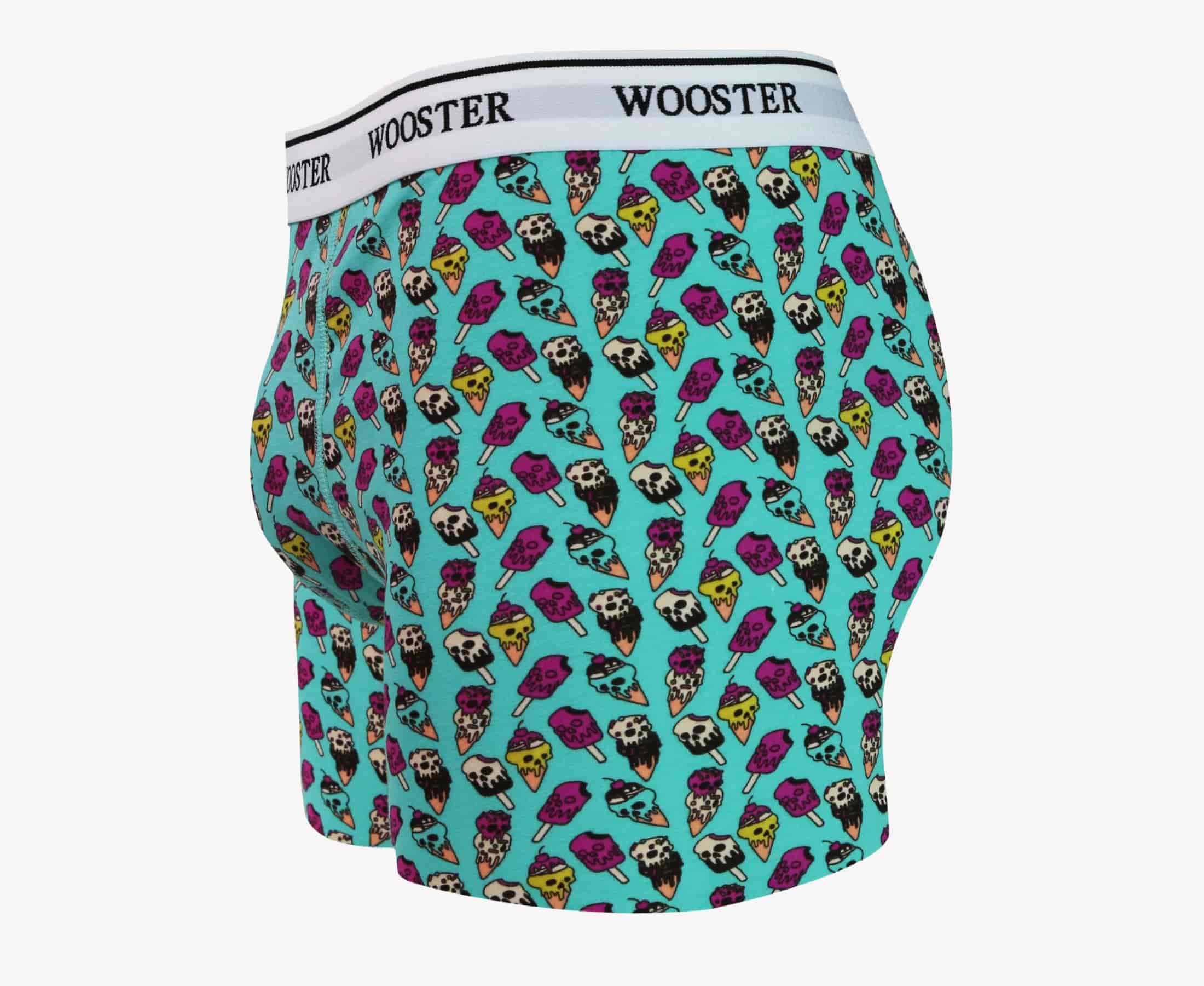 Side view of men’s 95% cotton teal boxer brief with multicolor ice cream skulls print, relaxed fit, vibrant colors, and smooth rear panel