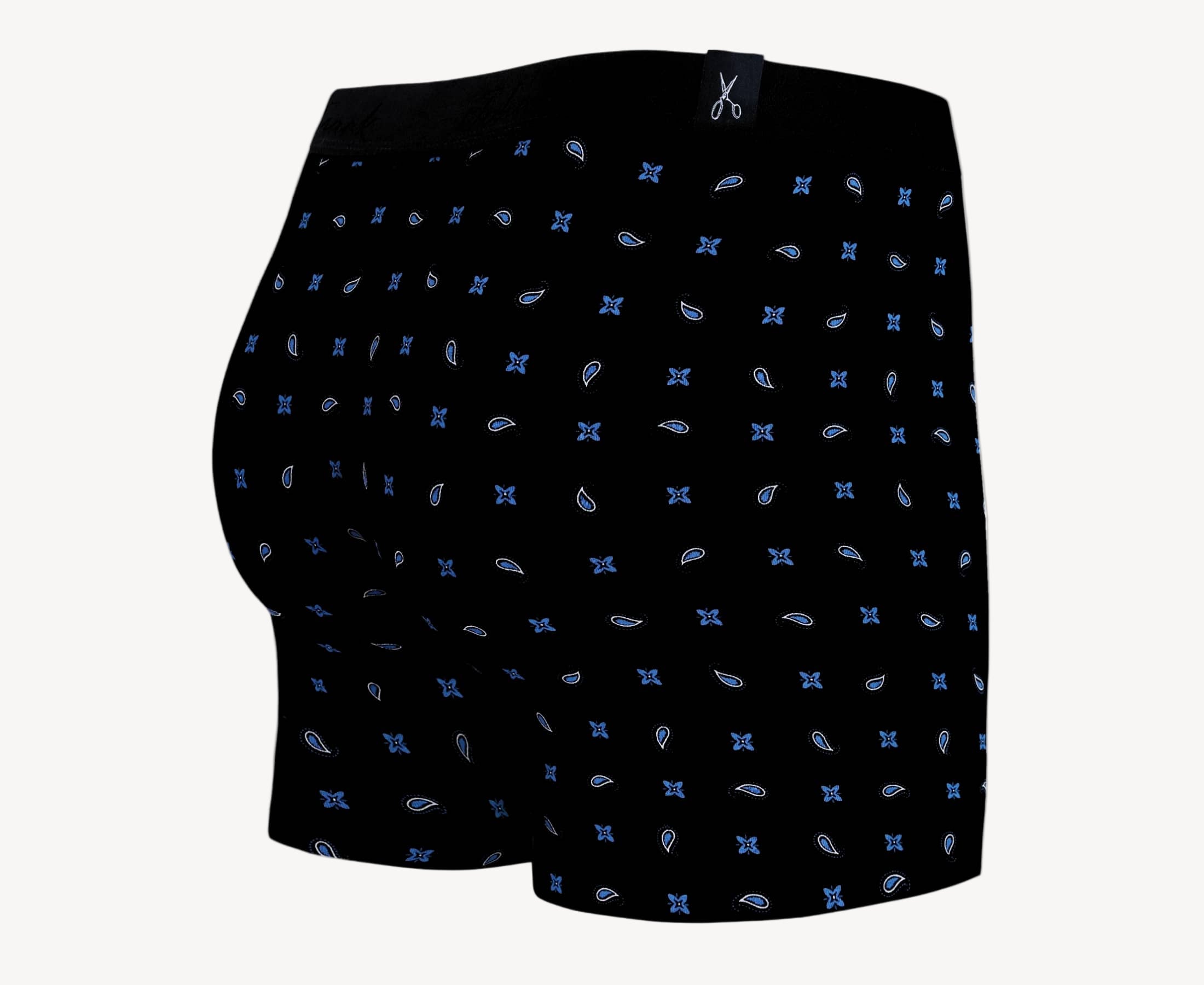 Side view of men’s 95% cotton boxer brief in black with alternating blue paisley and floral print, contoured pouch, and tailored leg cut