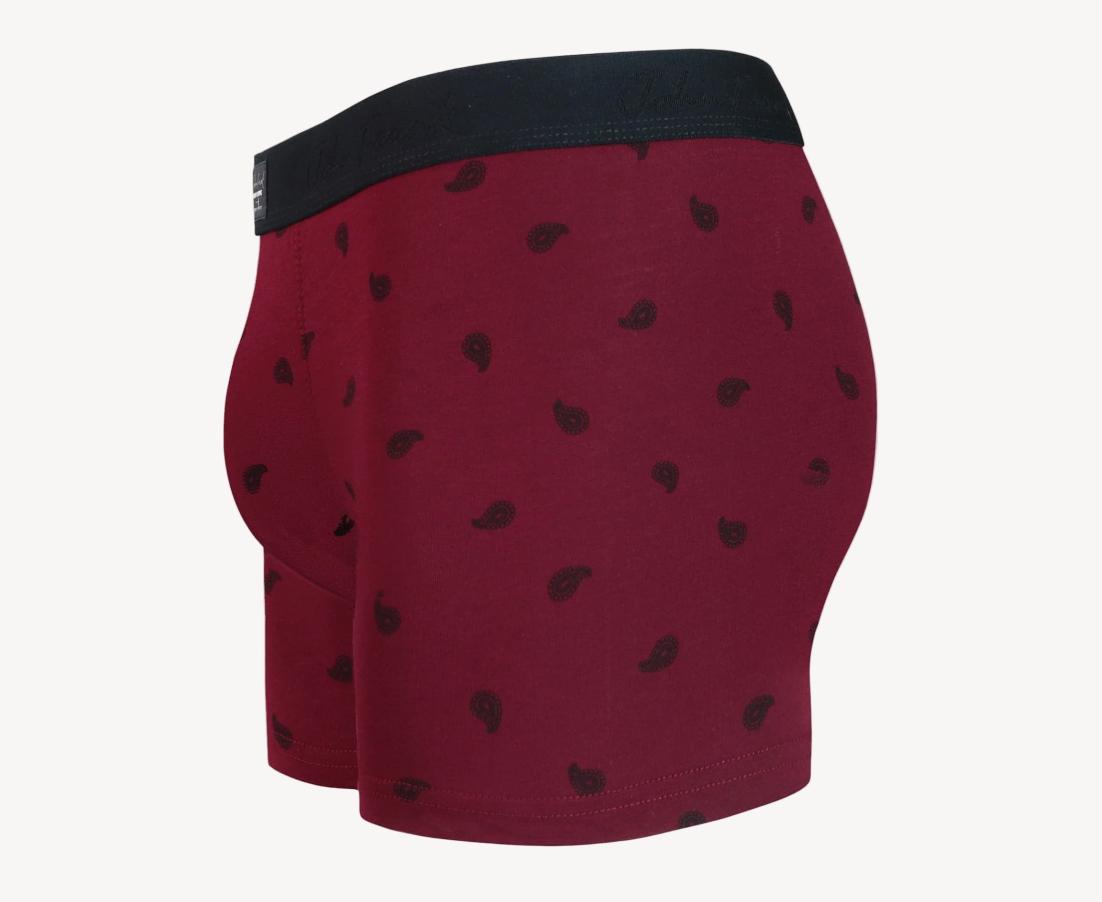 Side view of men’s 95% cotton boxer brief in burgundy with black paisley print, contoured pouch, and tailored leg cut