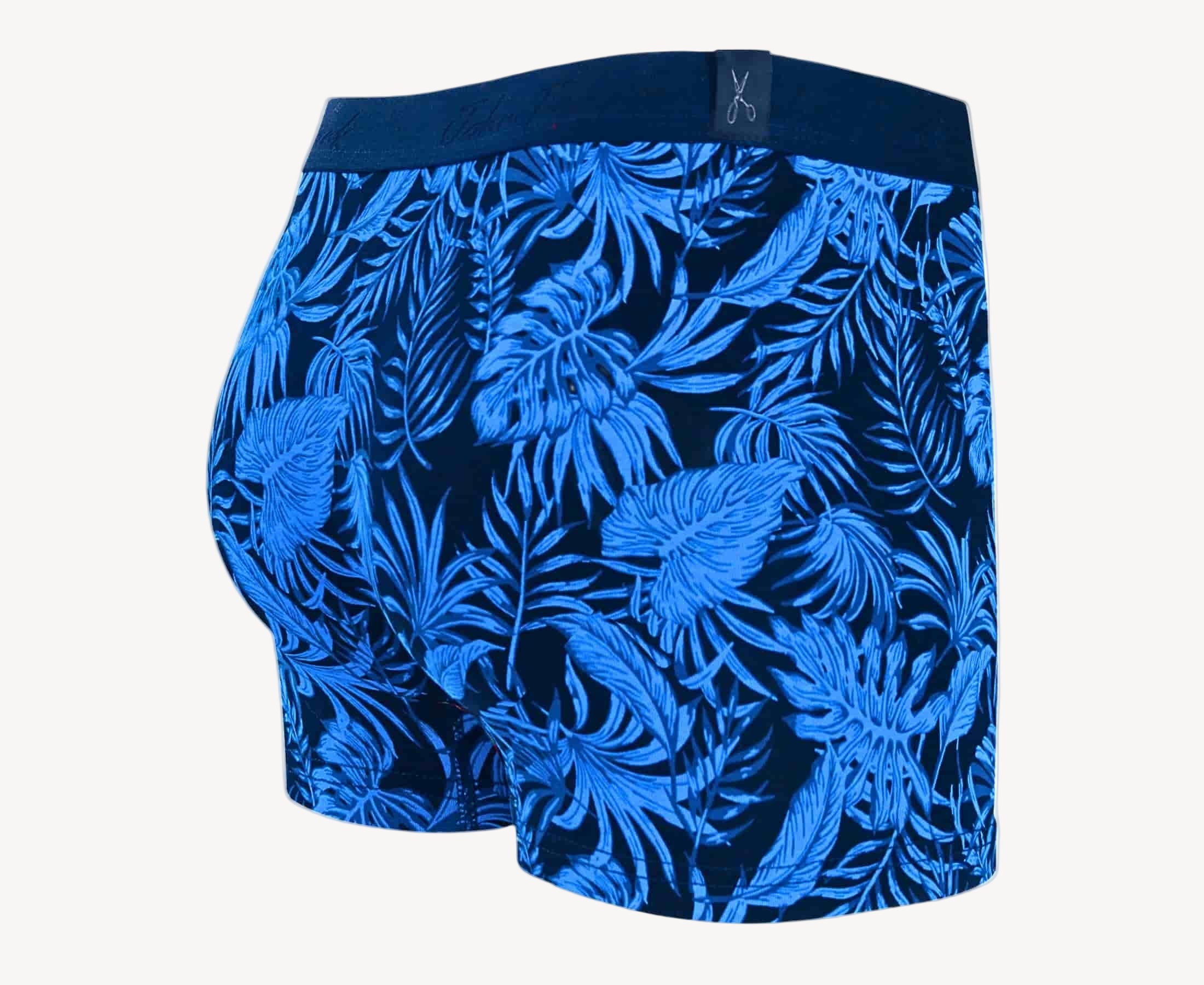 Back view of men’s 95% cotton boxer brief in navy with bright blue palm print, no-roll waistband, and clean rear detail