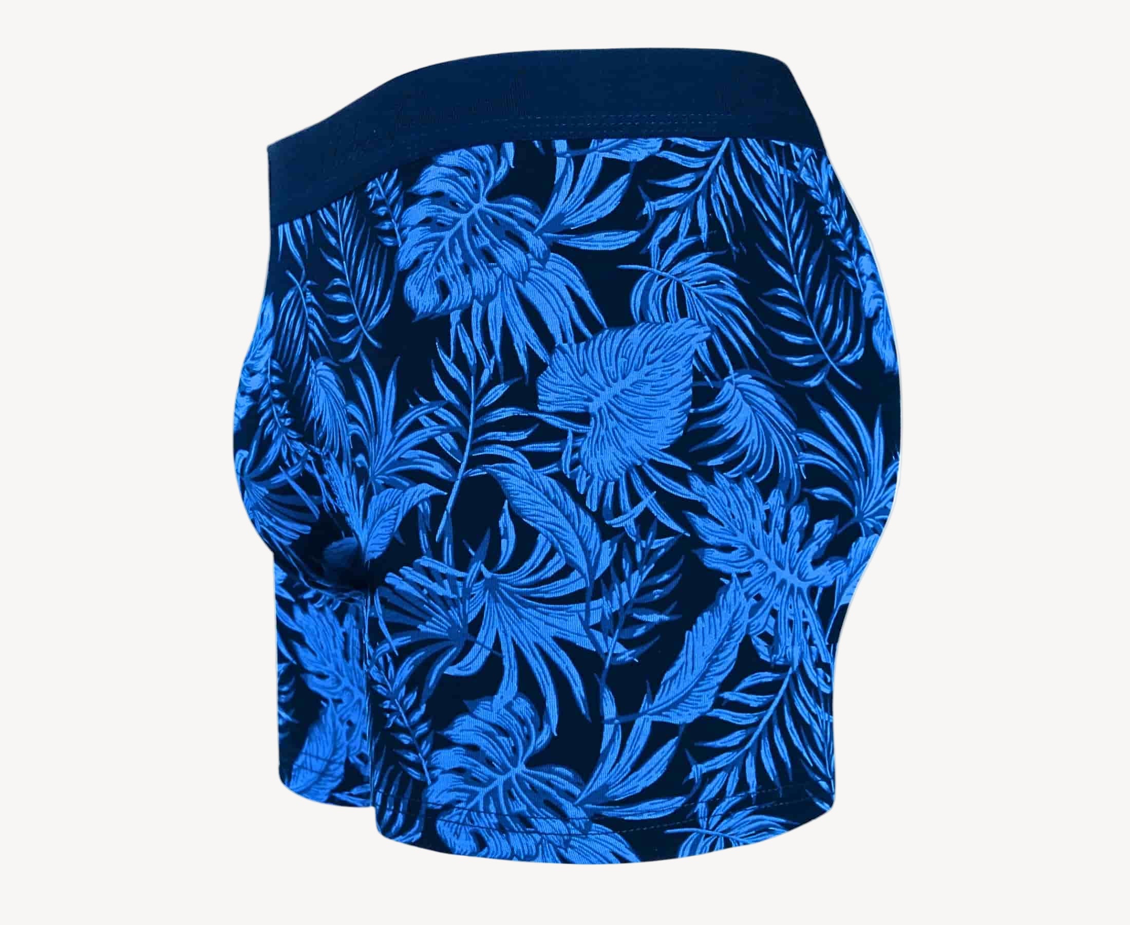 Side view of men’s 95% cotton boxer brief in navy with bright blue palm print, contoured pouch, and tailored leg cut