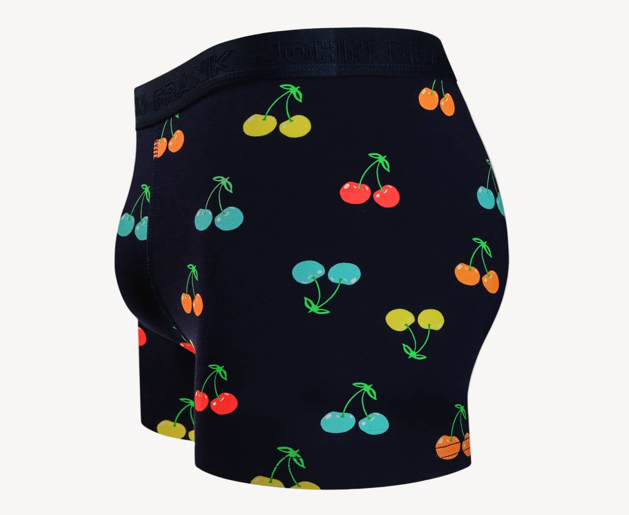 Side view of men’s 95% cotton boxer brief in navy with multicolor cherry print, contoured pouch, and tailored leg cut