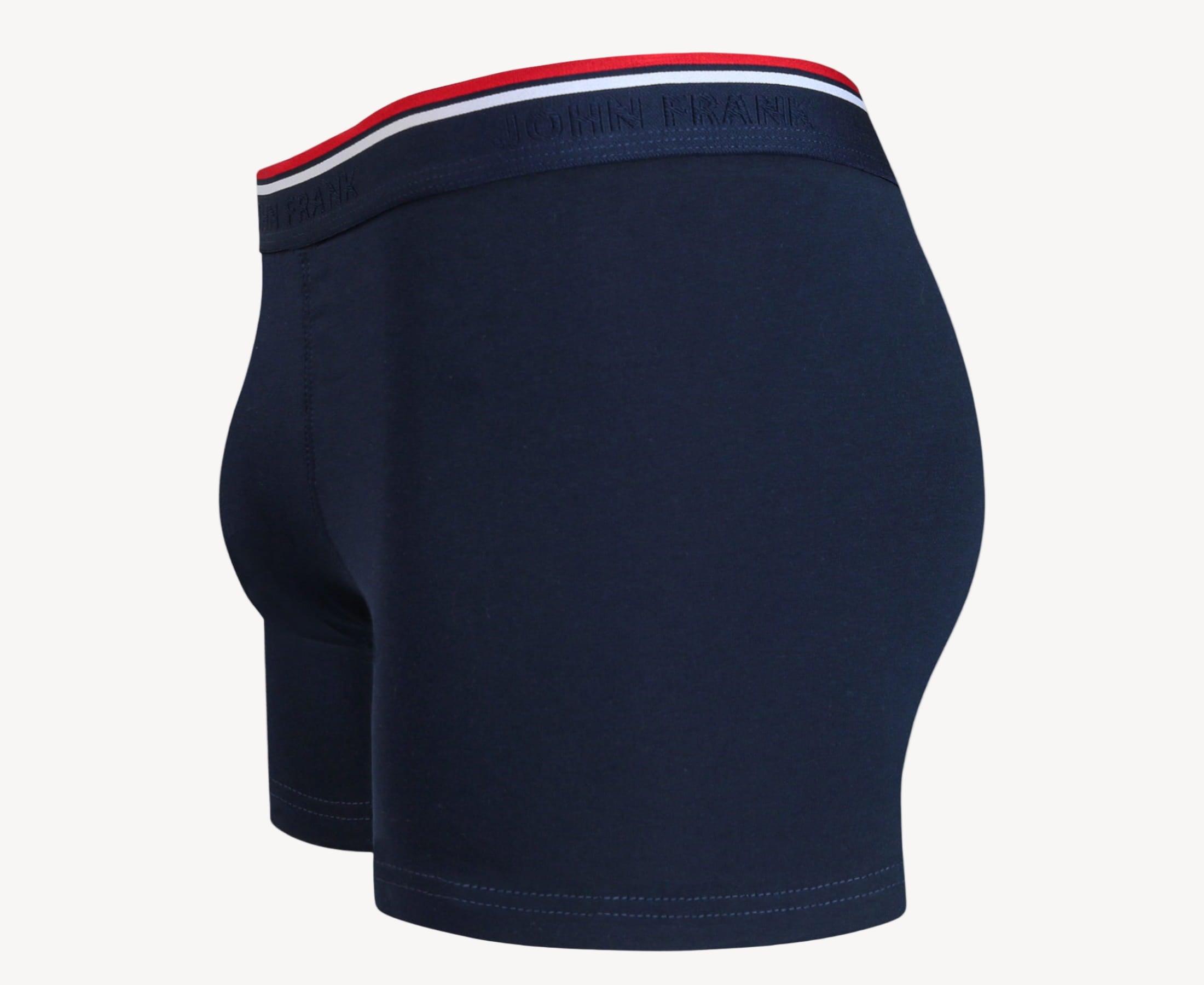 Side view of men’s 95% cotton boxer brief in navy solid with striped waistband, contoured pouch, and tailored leg cut