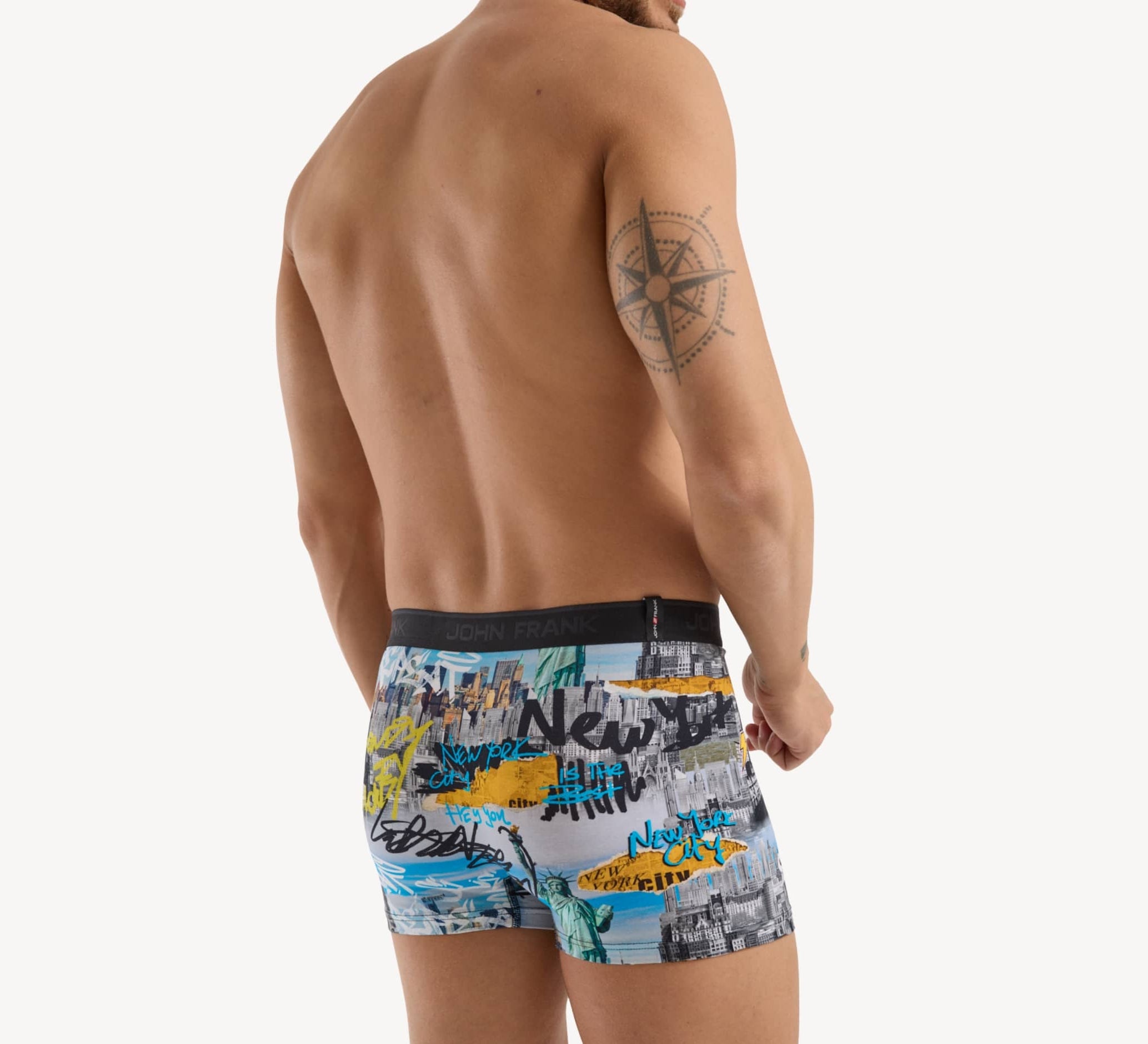 Back view of men’s 95% cotton boxer brief in multicolor NYC-inspired print with smooth waistband and rear detail