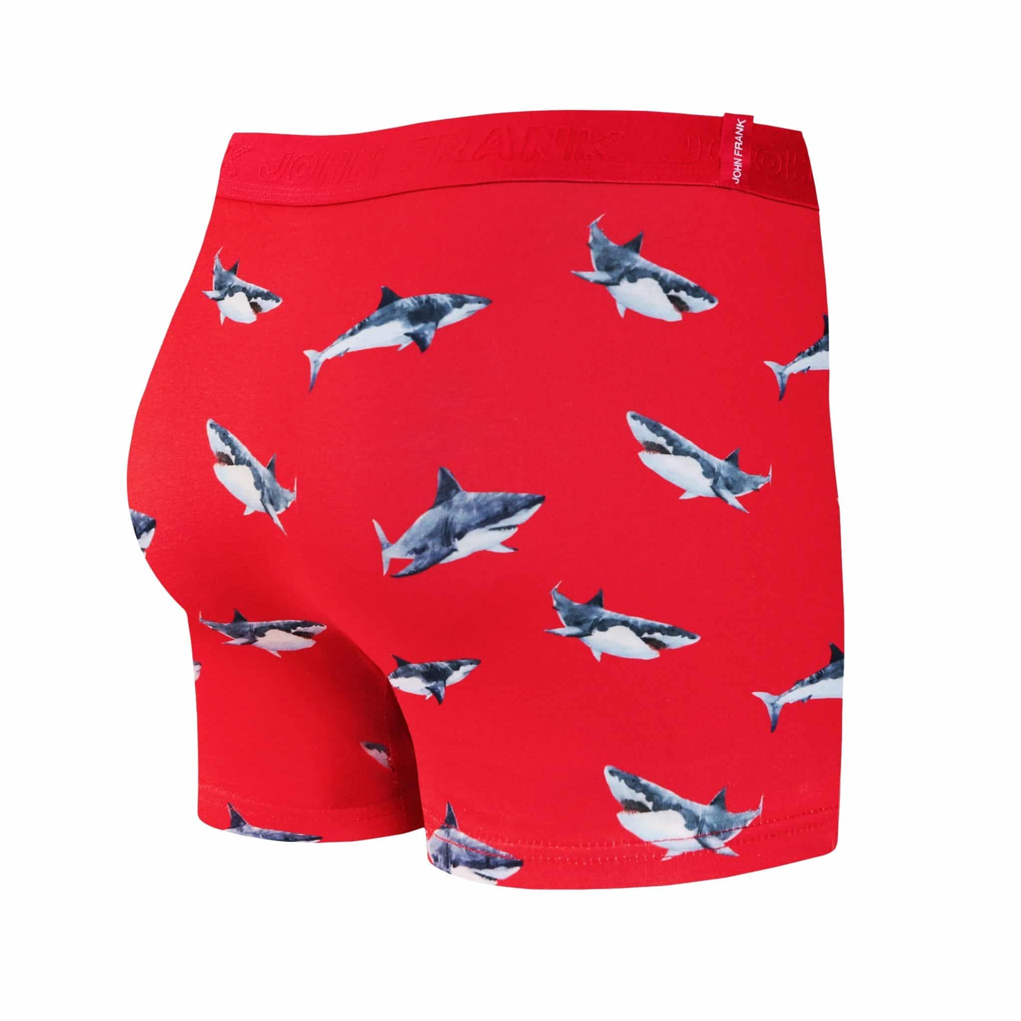 Back view of men’s 95% cotton boxer brief in coral with shark print, smooth waistband, and rear detail