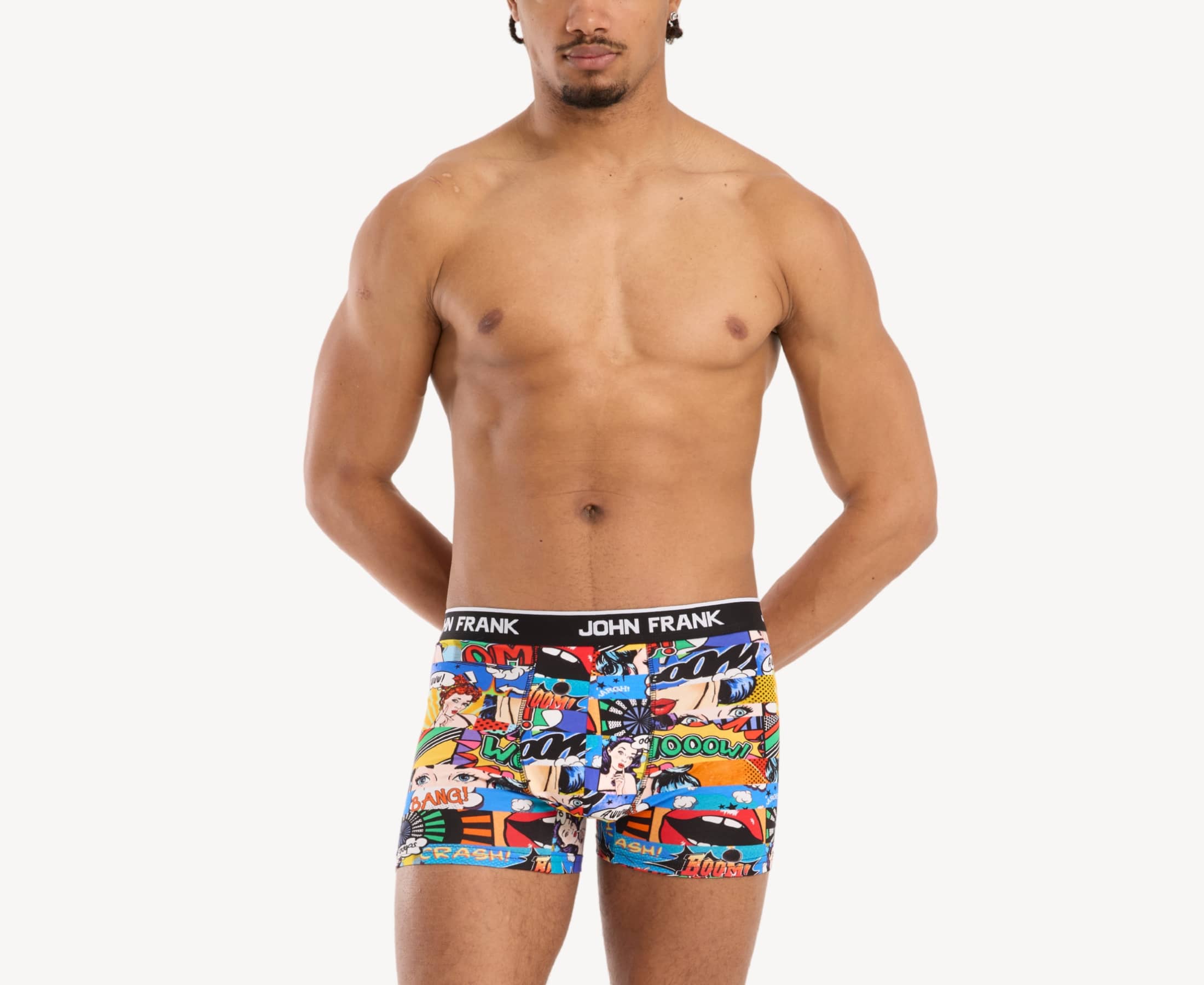Front view of model wearing men’s 95% cotton boxer brief in multicolor pop art print with smooth waistband and soft stretch fit