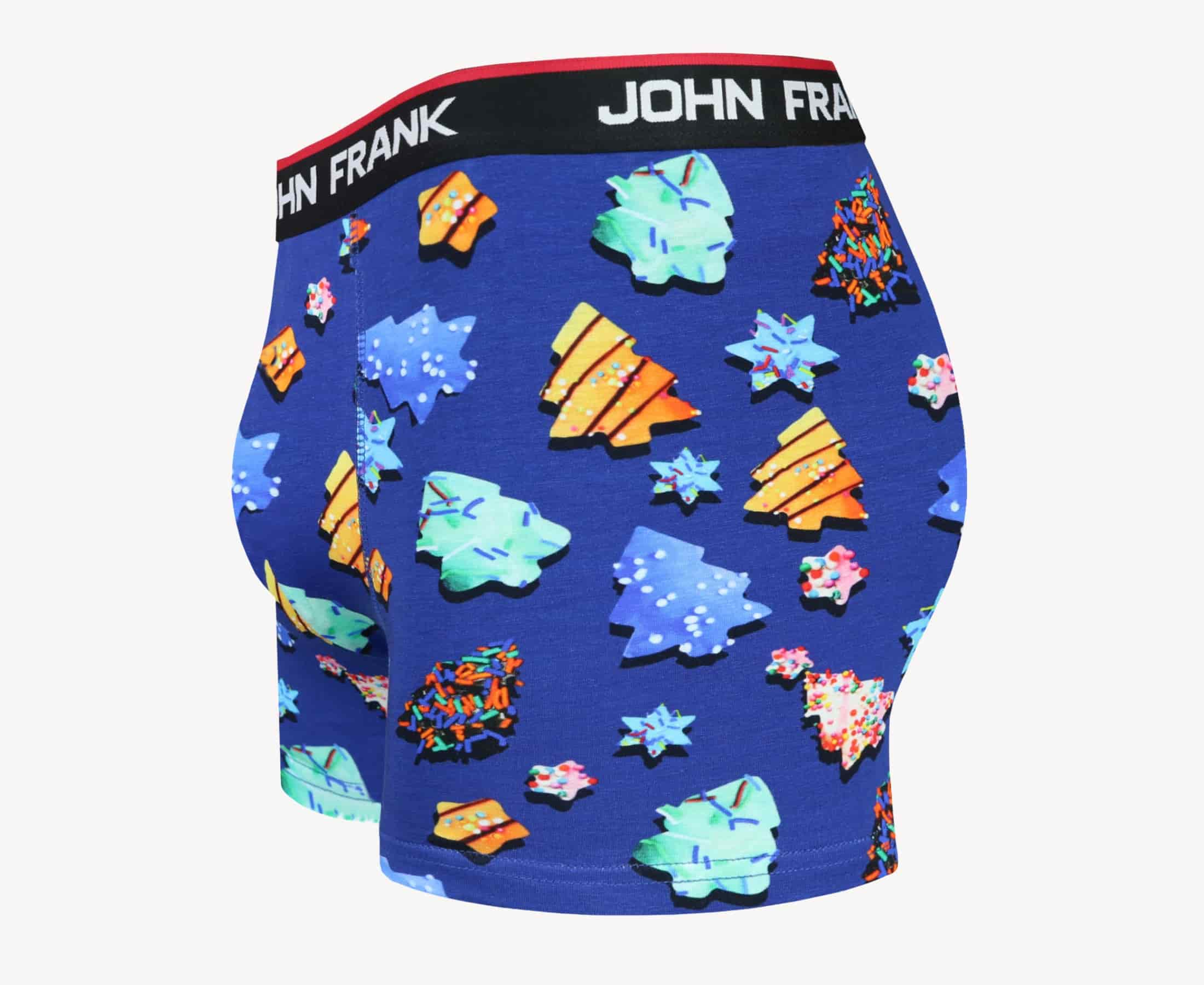 Side view of men’s 95% cotton boxer brief in royal blue with colorful sugar cookies print, contoured pouch, and tailored leg cut