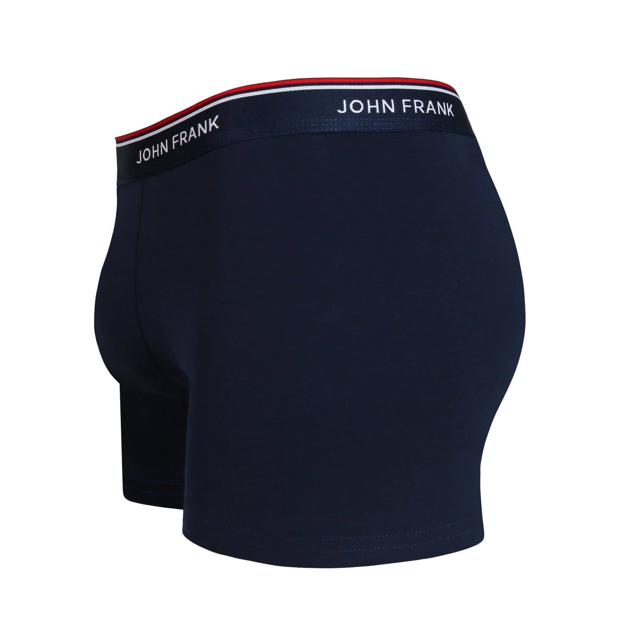 Side view of men’s 95% cotton boxer brief in midnight blue with midnight blue striped waistband, contoured pouch, and tailored leg cut