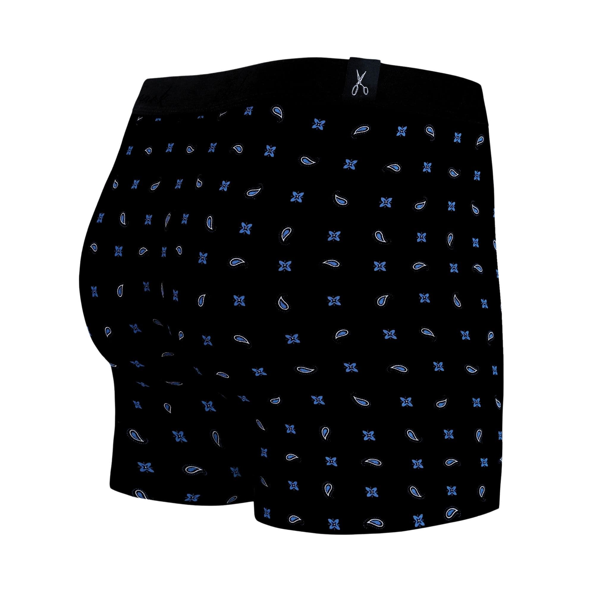 Back view of men’s 95% cotton boxer brief in black with alternating blue paisley and floral print, no-roll waistband, and clean rear detail