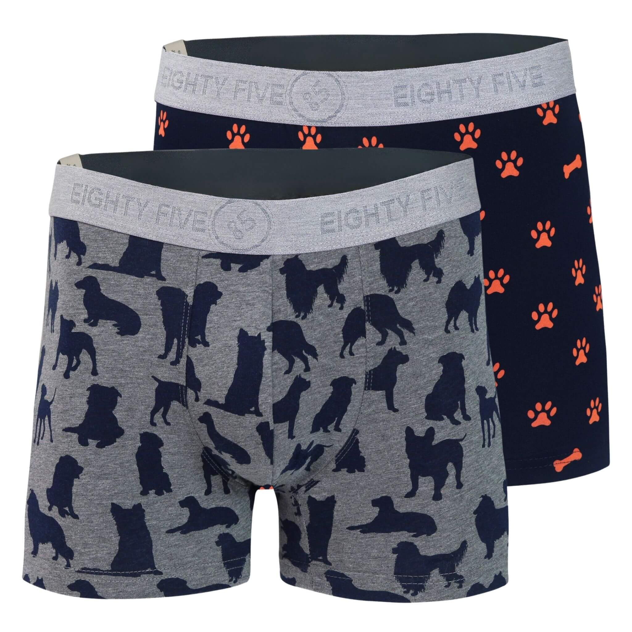 Full pack view of men’s 95% cotton boxer brief 2-pack — one navy with orange paws and bones, one gray with navy dog print