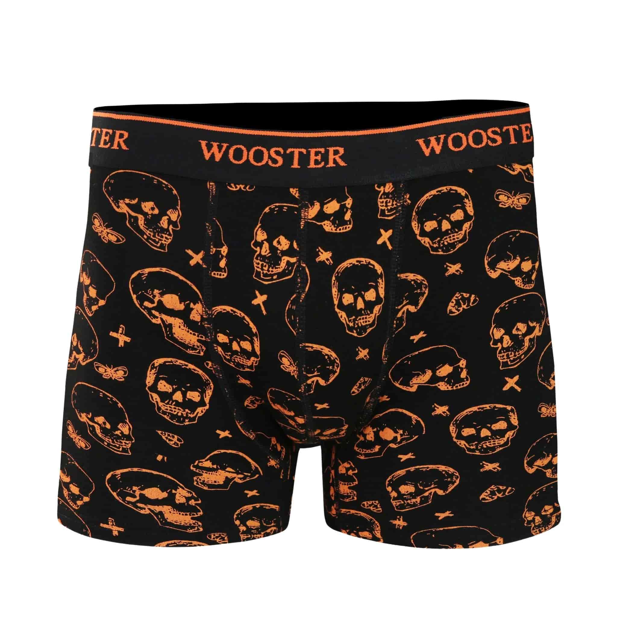 Front view of men’s 95% cotton black boxer brief with orange skulls print, relaxed fit, soft stretch cotton, and no-roll waistband