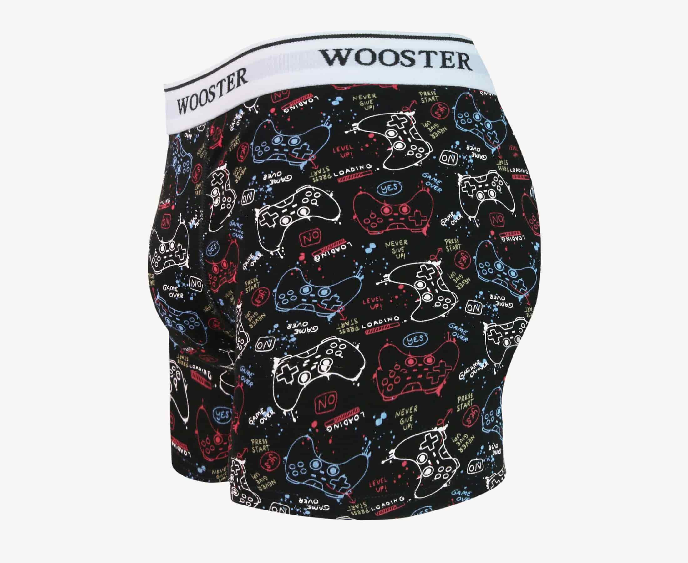 Side view of men’s 95% cotton black boxer brief with multicolor gaming console print showing contoured pouch and relaxed fit