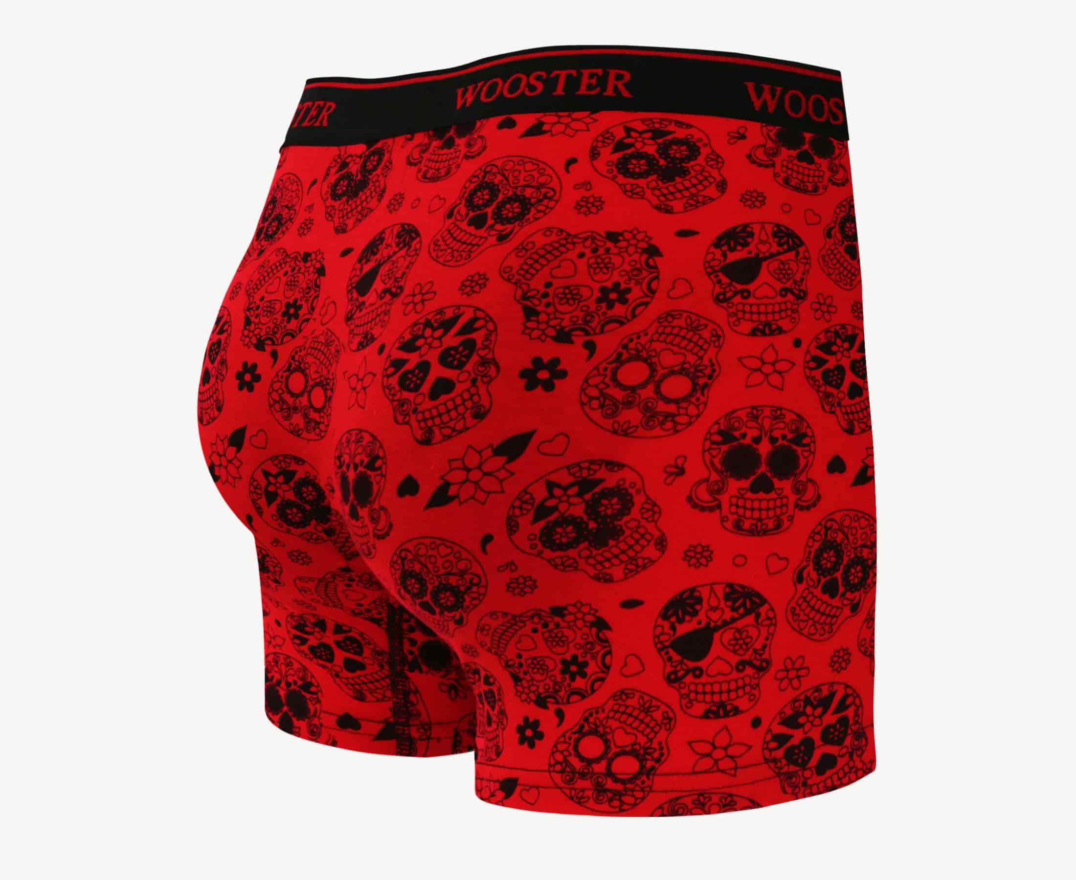 Back view of men’s 95% cotton crimson red boxer brief with black skulls in bloom print, relaxed fit, vibrant colors, and smooth rear panel