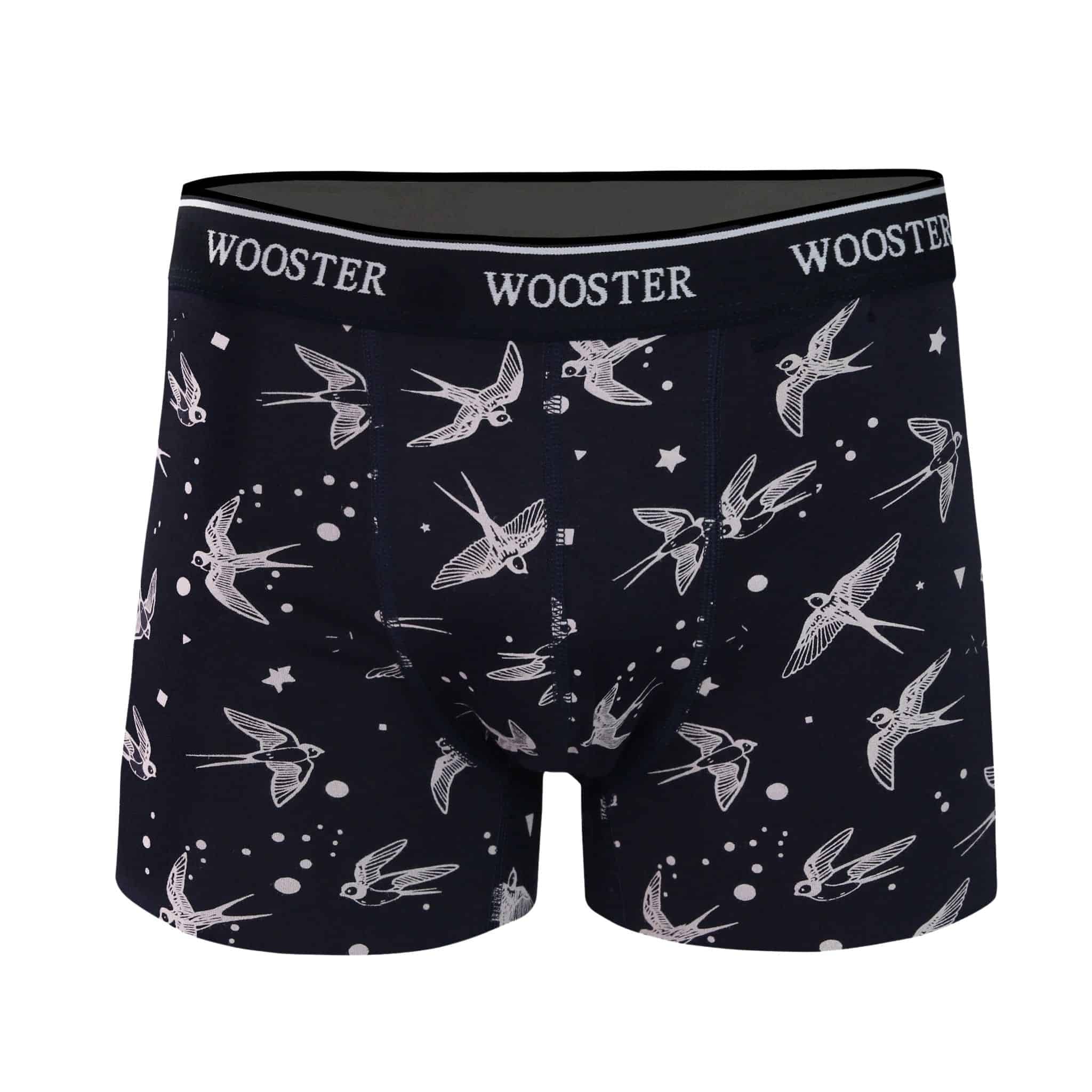 Front view of men’s 95% cotton navy boxer brief with light pink starling birds, stars, and moon print, relaxed fit, soft stretch cotton, and no-roll waistband