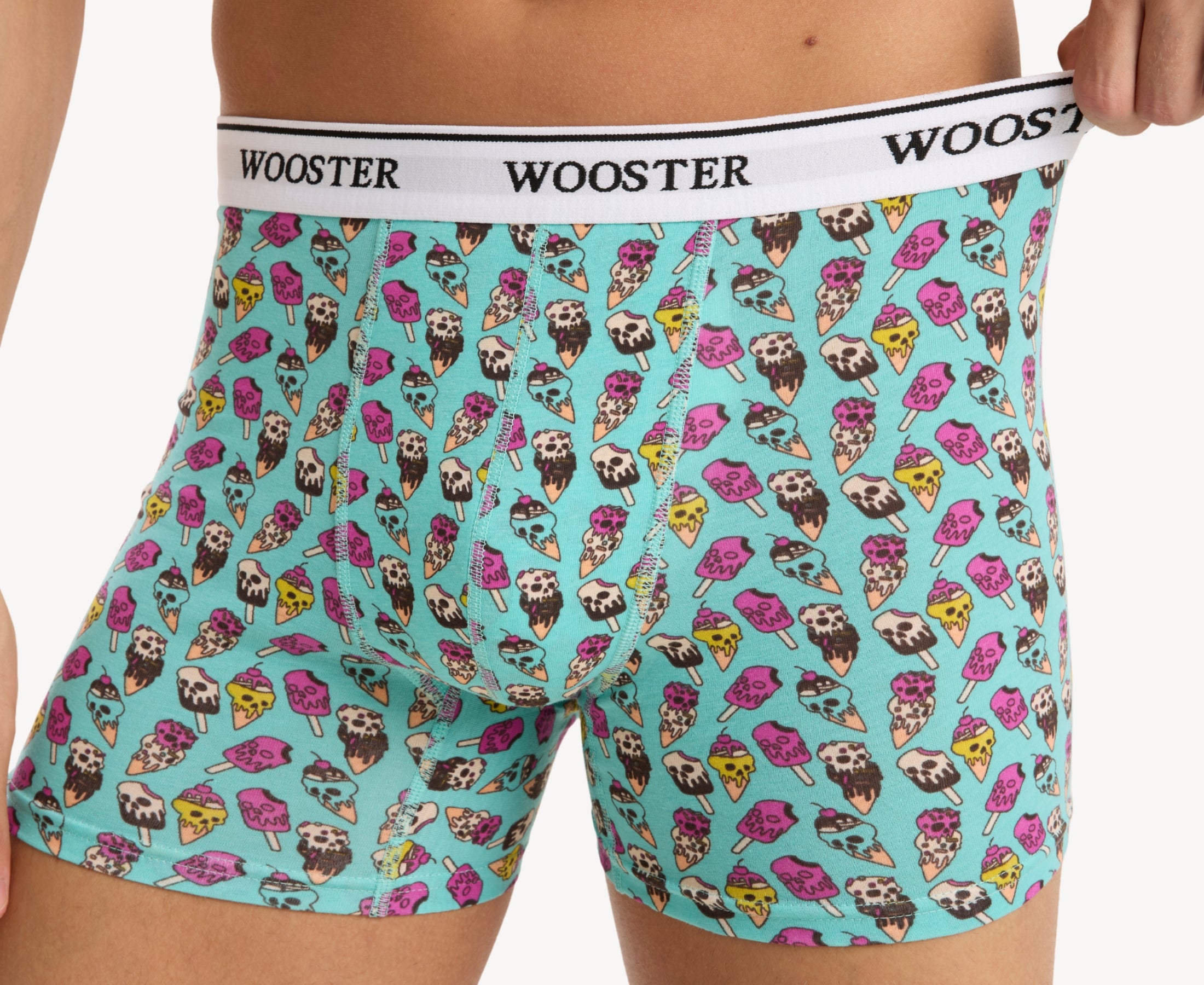 Close-up view of men’s 95% cotton teal boxer brief with multicolor ice cream skulls print, showcasing waistband and soft stretch fabric