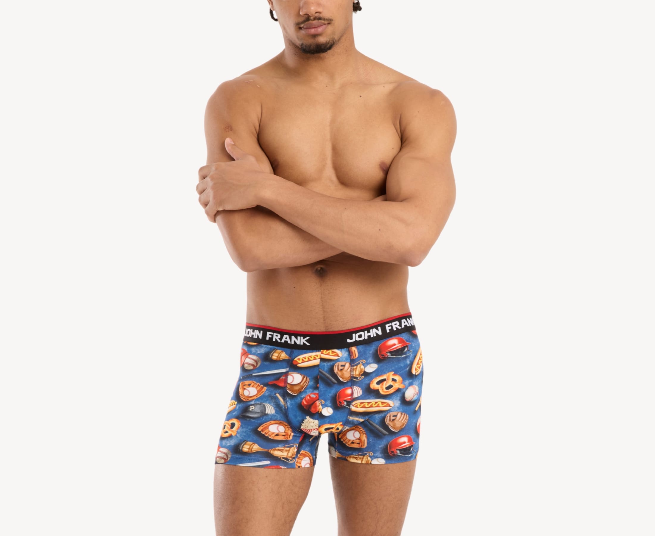 Front view of model wearing men’s 95% cotton boxer brief in baseball-inspired print with soft stretch and no-roll waistband