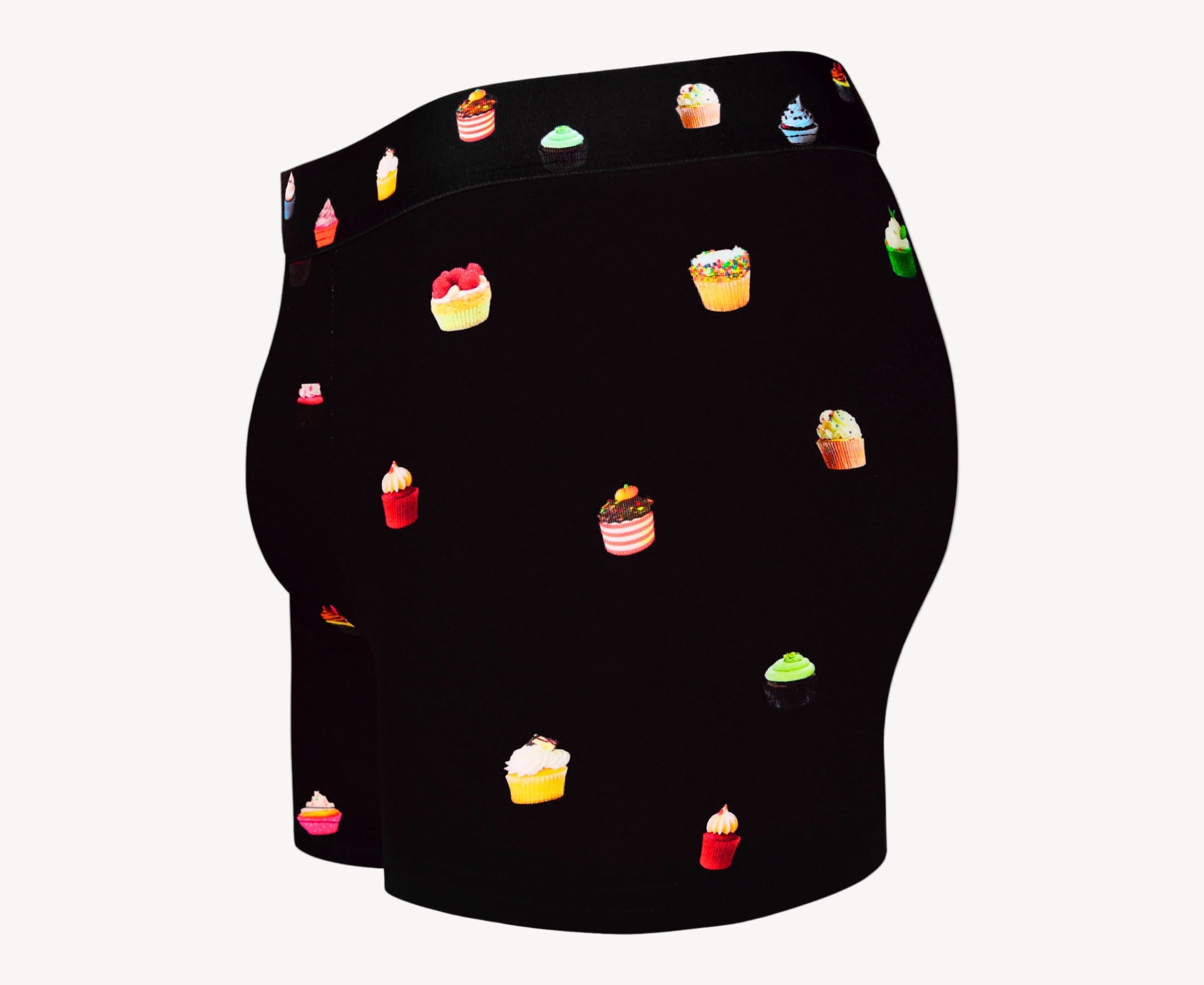 Side view of men’s 95% micromodal boxer brief in navy with cupcake print, contoured pouch and tailored leg cut