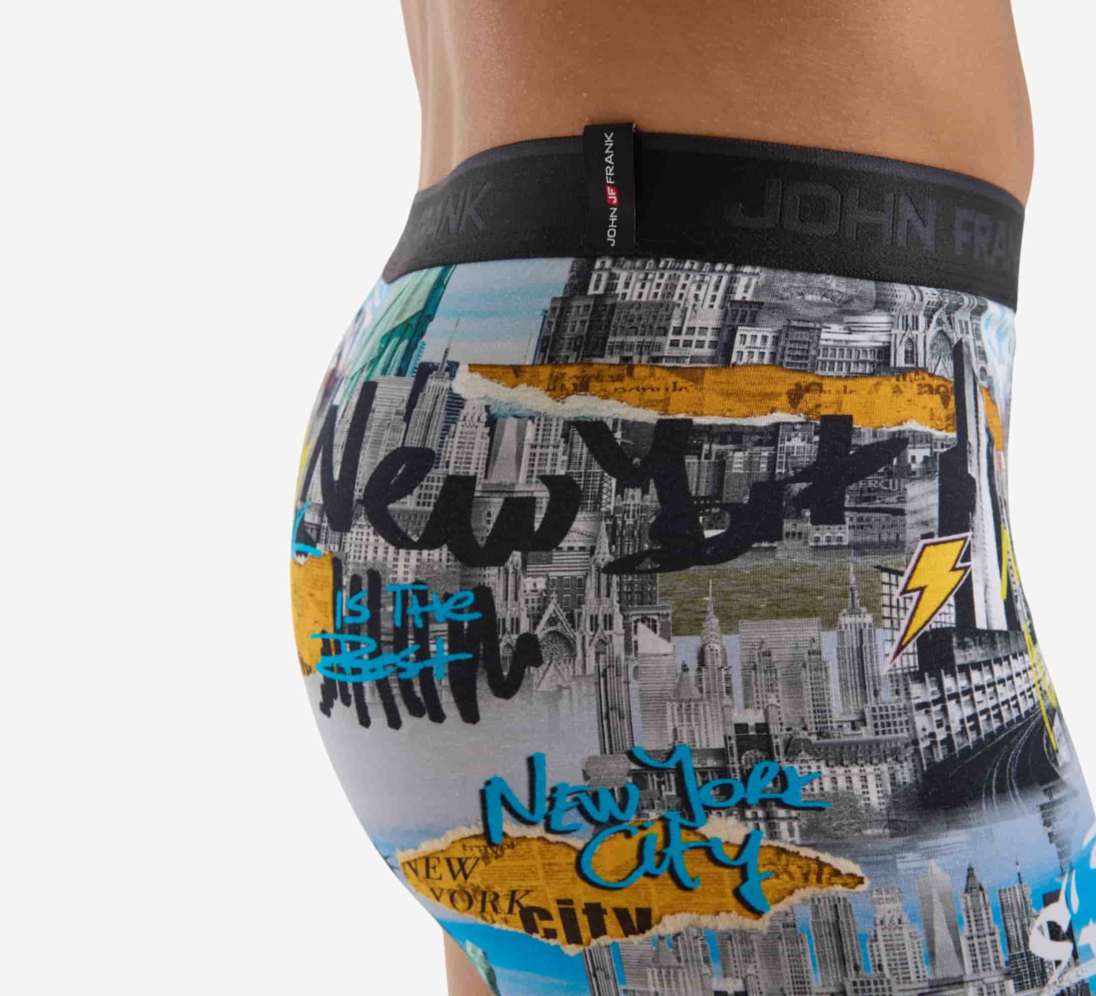 Detail view of men’s 95% cotton boxer brief in multicolor NYC-inspired print, showcasing smooth waistband