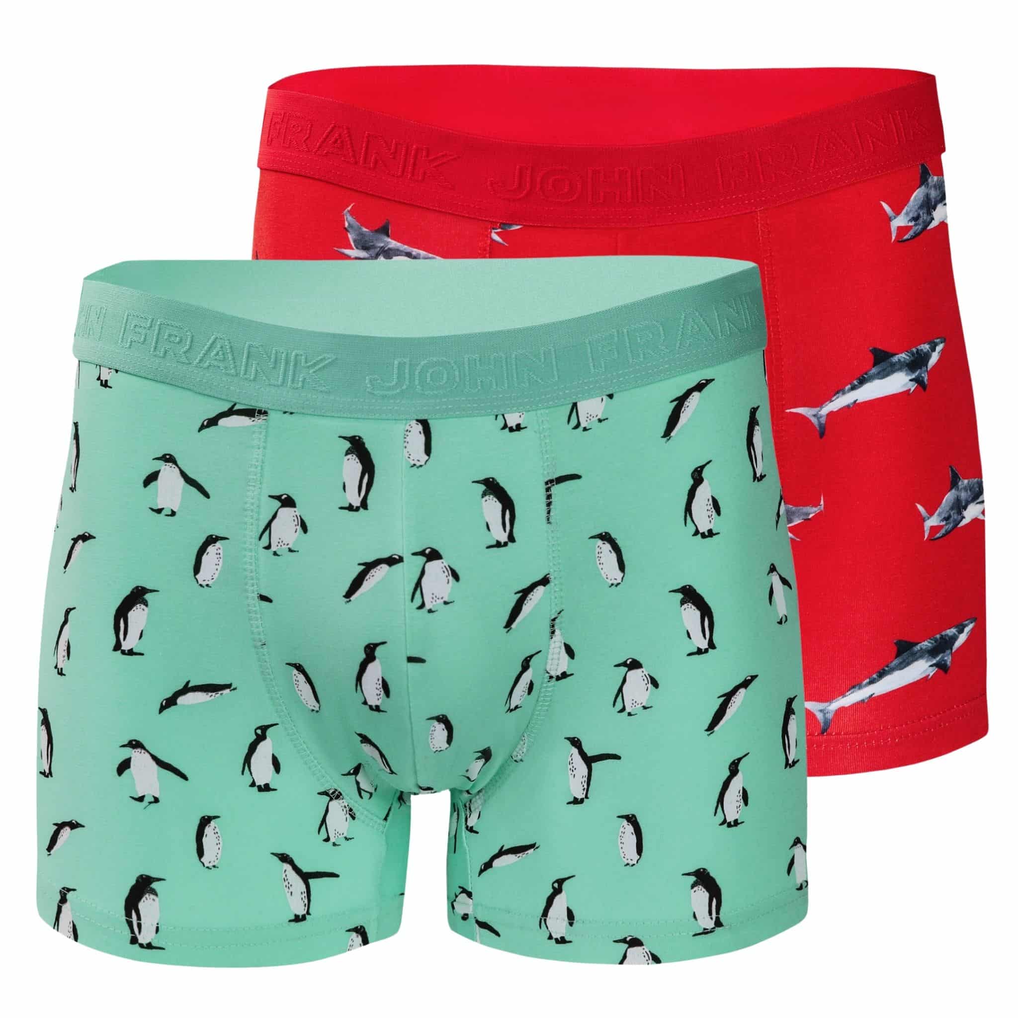 Full pack view of men’s 95% cotton boxer brief 2-pack — one turquoise with penguins, one coral with sharks