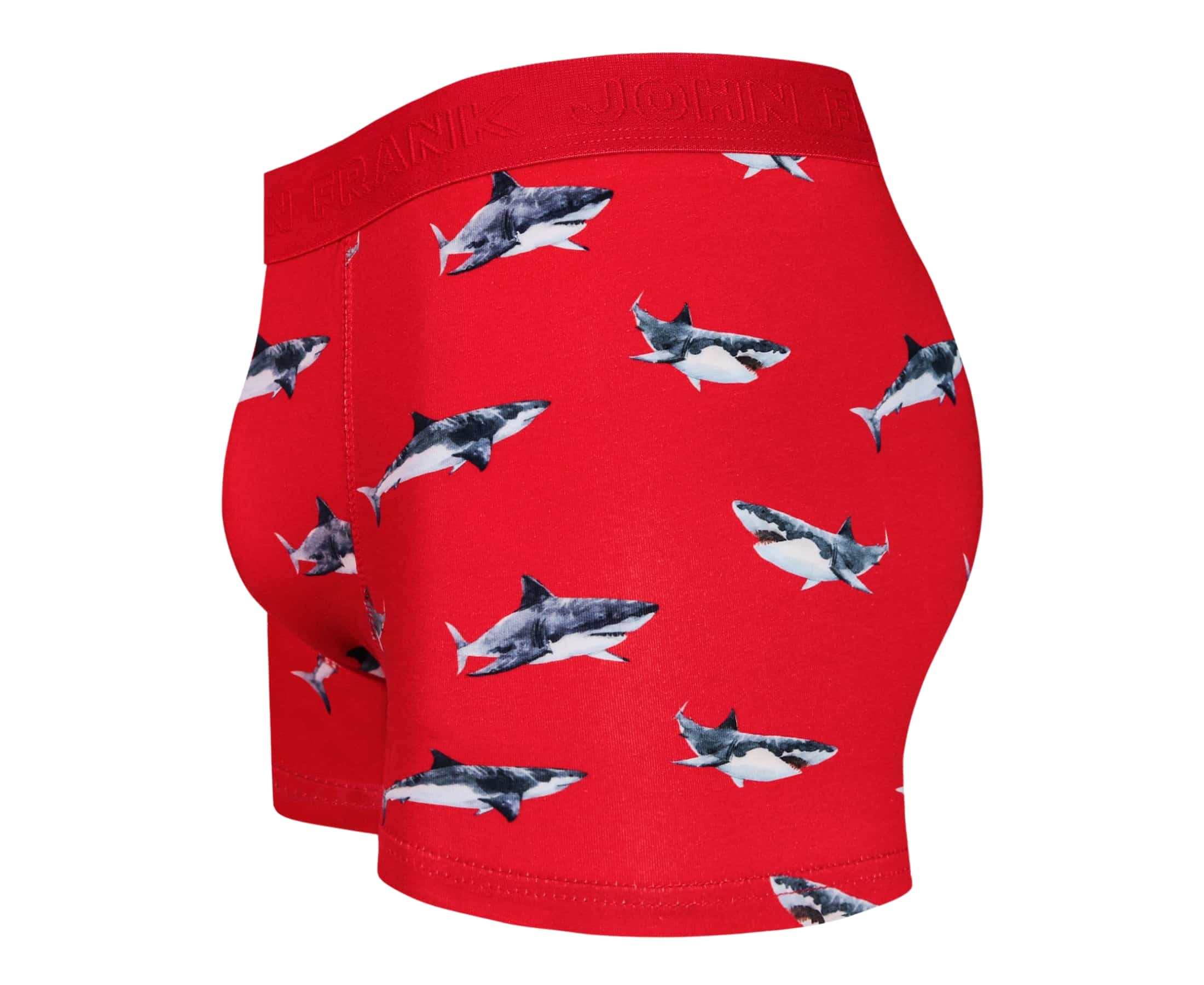 Side view of men’s 95% cotton boxer brief in coral with shark print, contoured pouch, and tailored leg cut