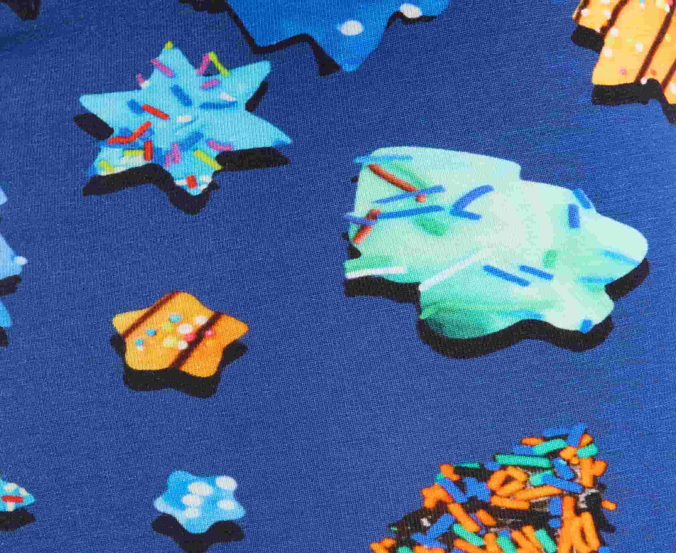 Royal blue fabric with colorful sugar cookies print