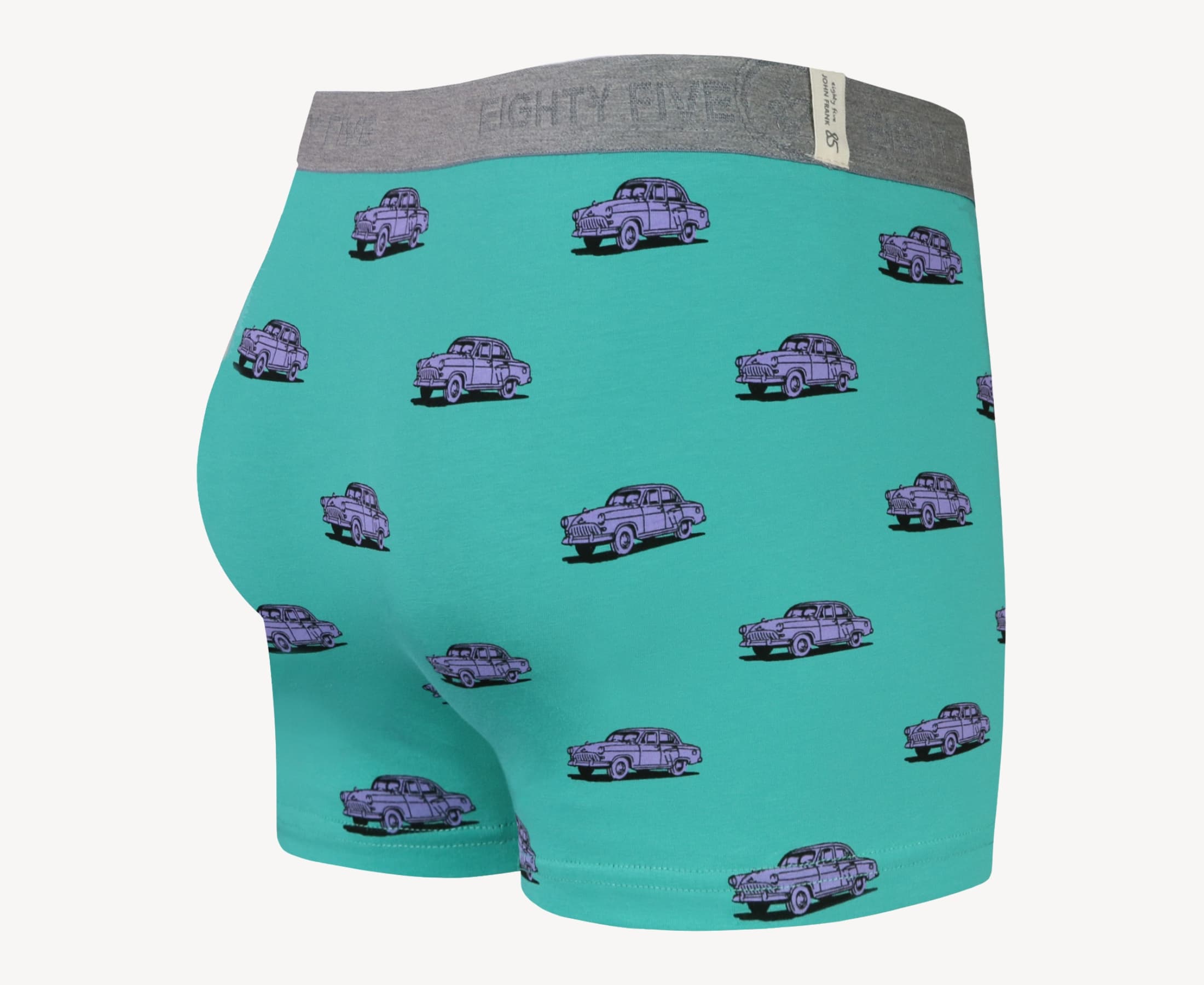 Back view of men’s 95% cotton boxer brief in turquoise with pink vintage car print, smooth waistband, and rear detail