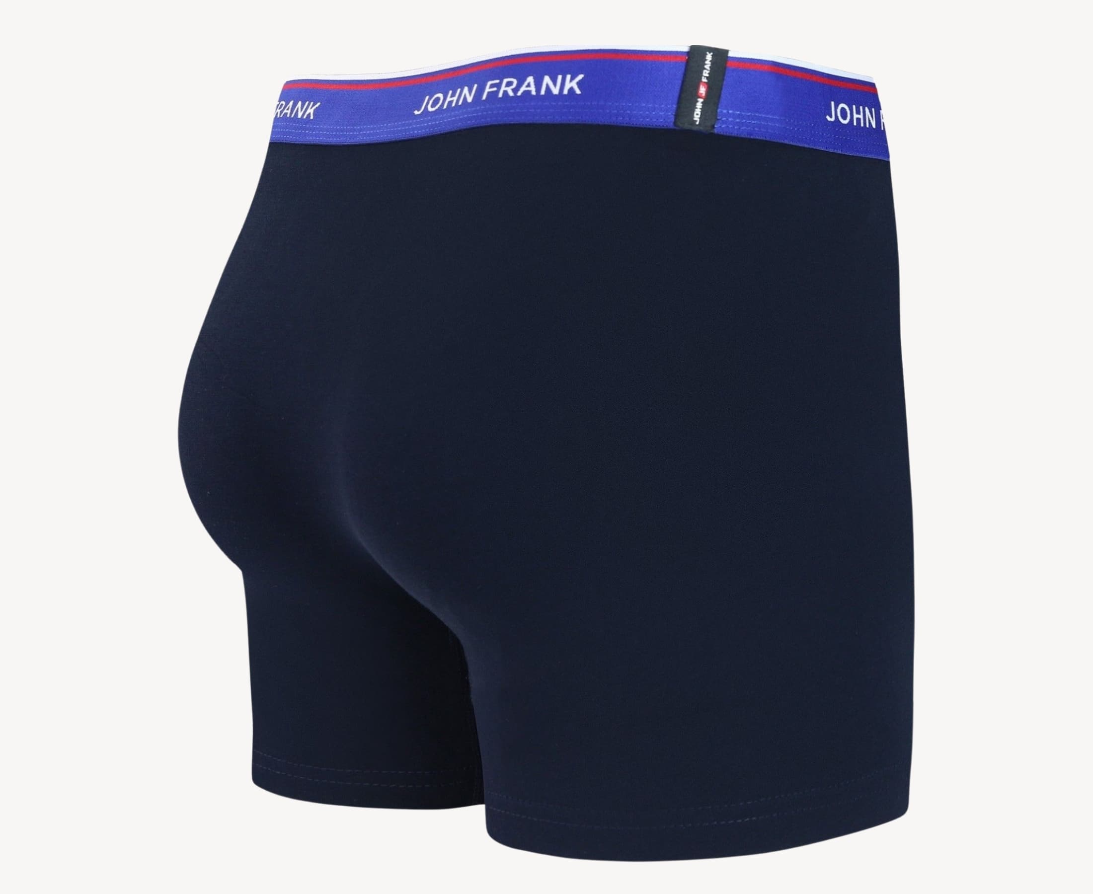 Back view of men’s 95% cotton boxer brief in midnight blue with indigo striped waistband and rear detail