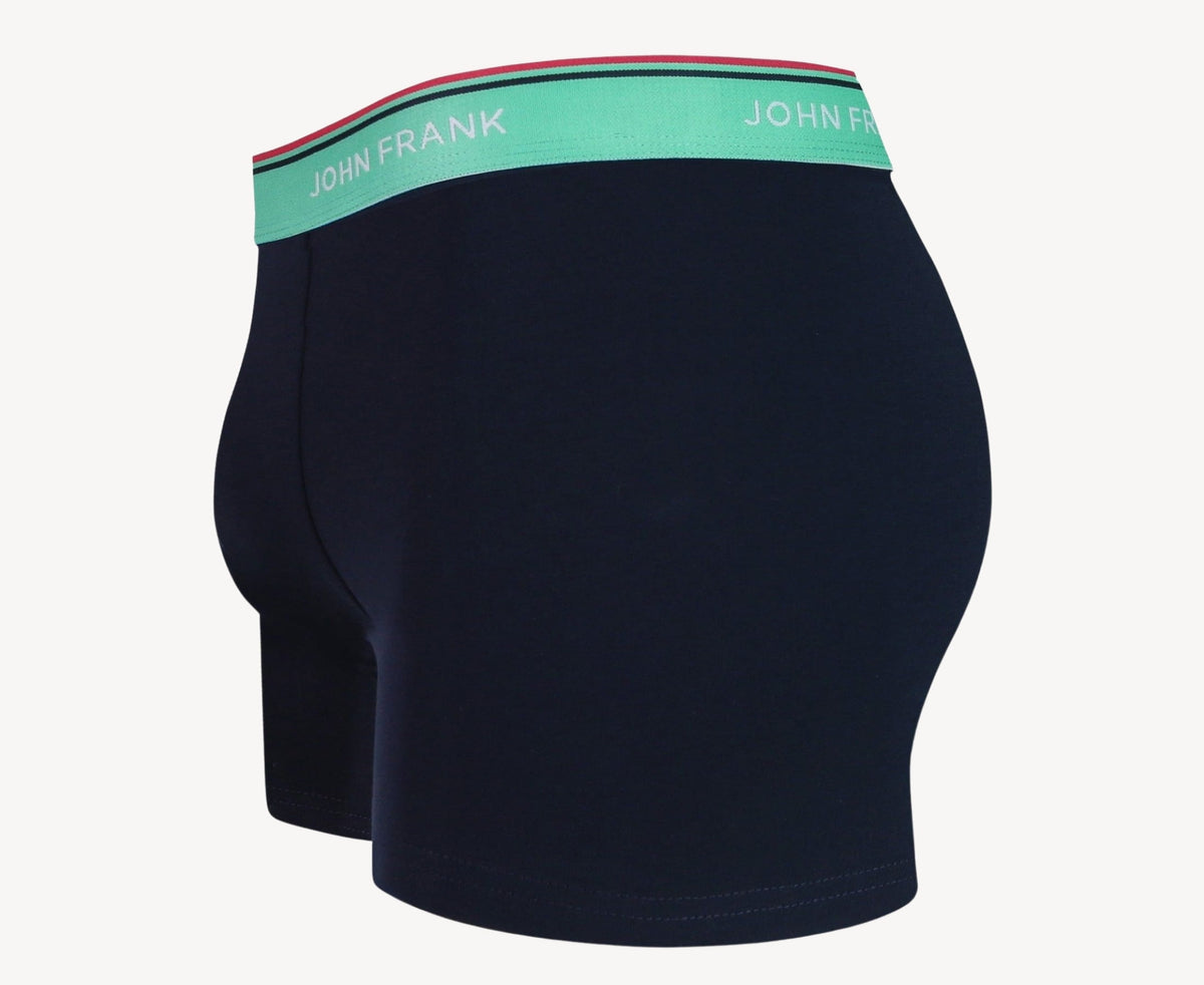 Side view of men’s 95% cotton boxer brief in midnight blue with sea green striped waistband, contoured pouch, and tailored leg cut