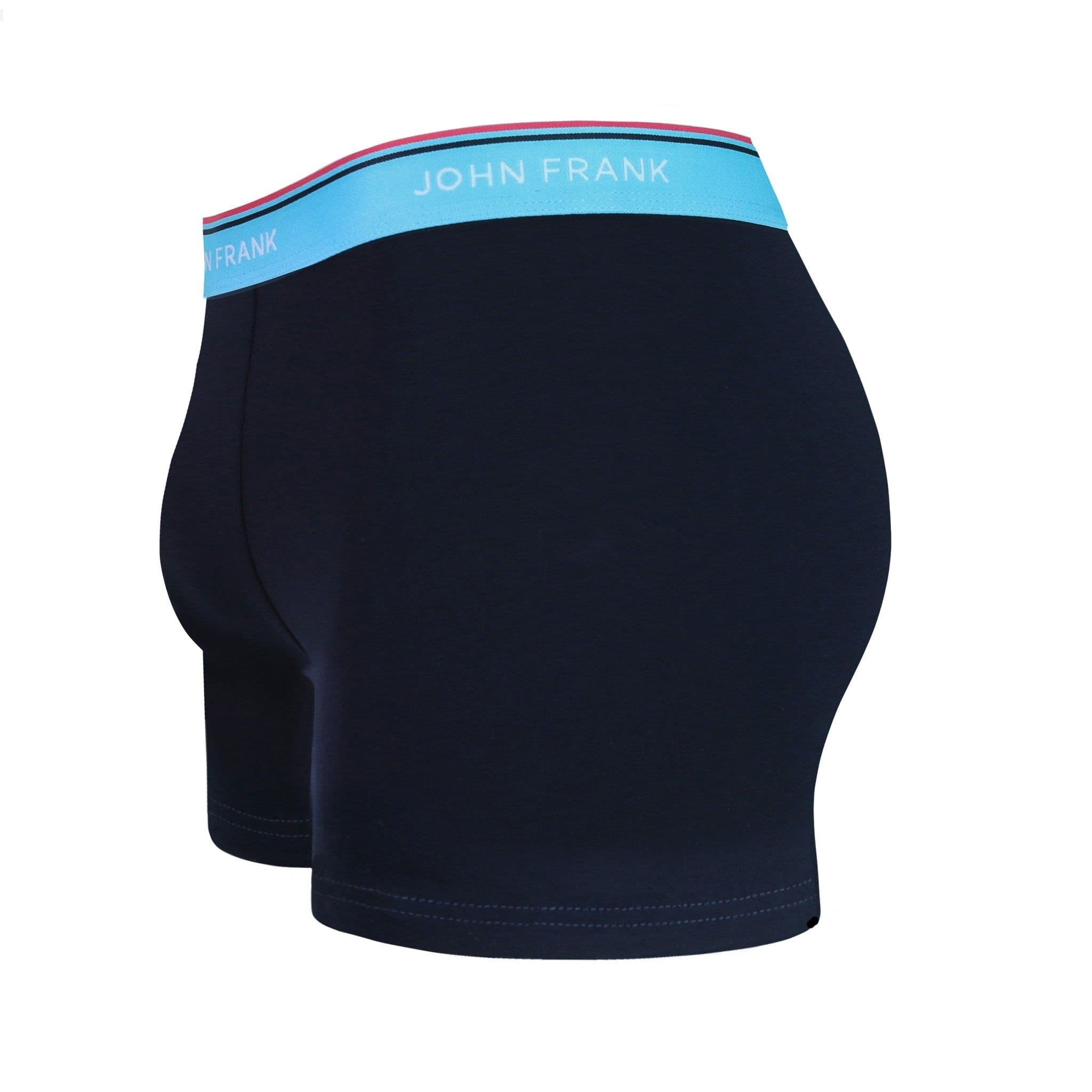 Side view of men’s 95% cotton boxer brief in midnight blue with turquoise striped waistband, contoured pouch, and tailored leg cut