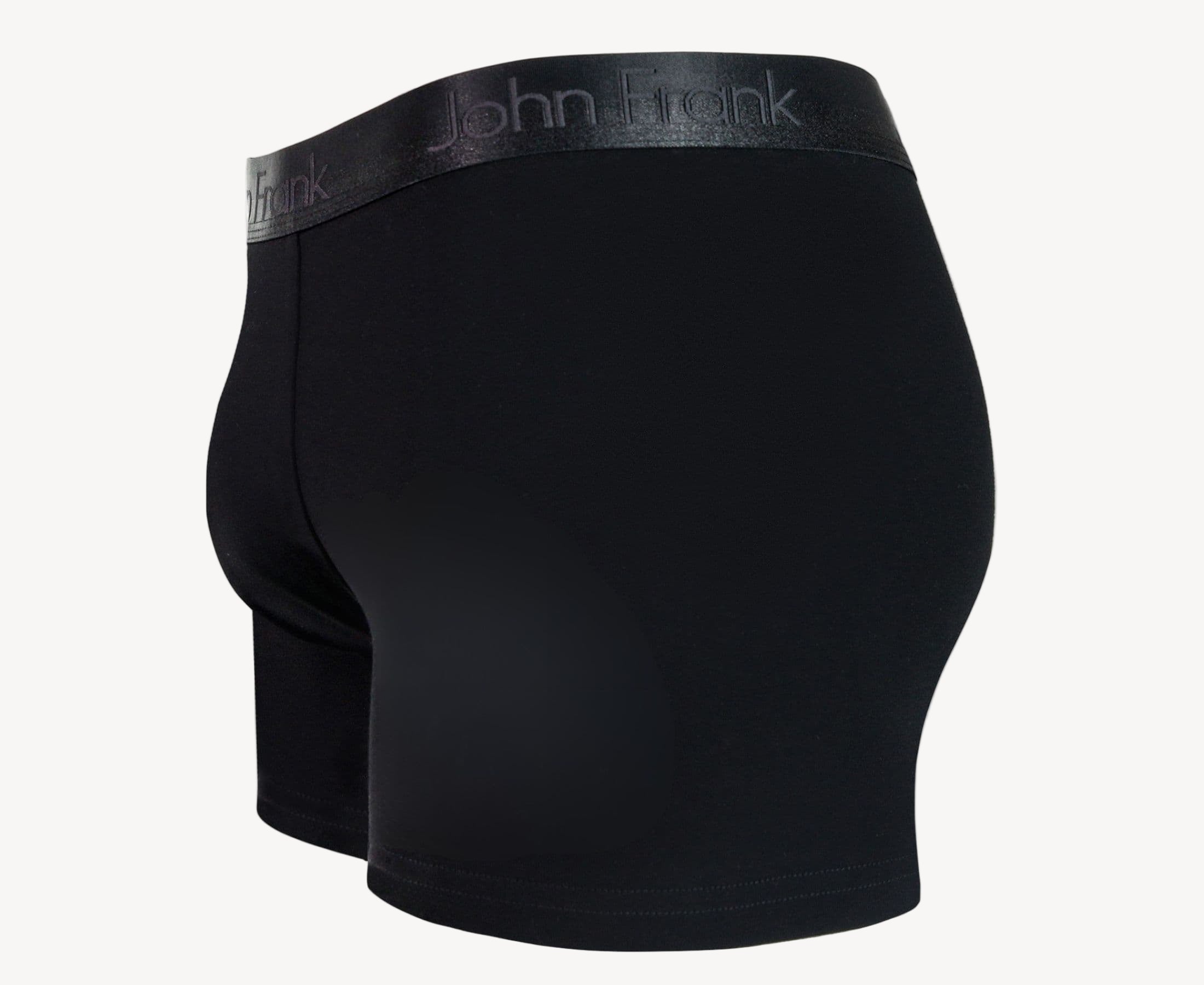 Side view of men’s 95% cotton boxer brief in black with pitch black shiny waistband, contoured pouch, and tailored leg cut
