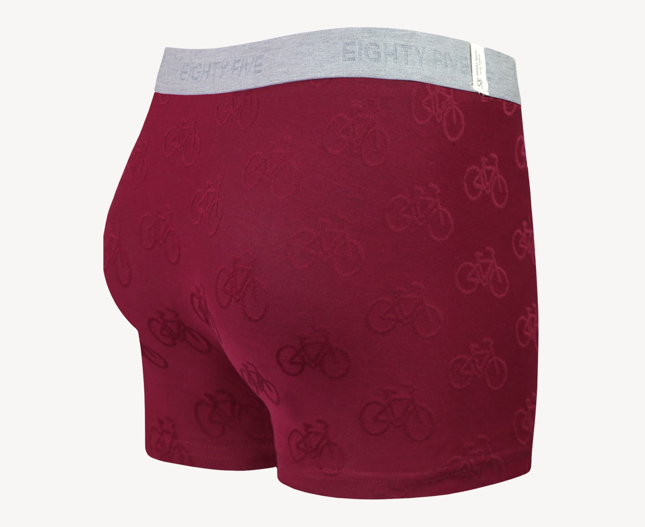 Back view of men’s 95% cotton boxer brief in burgundy with jacquard bicycles pattern, showcasing smooth waistband and rear detail