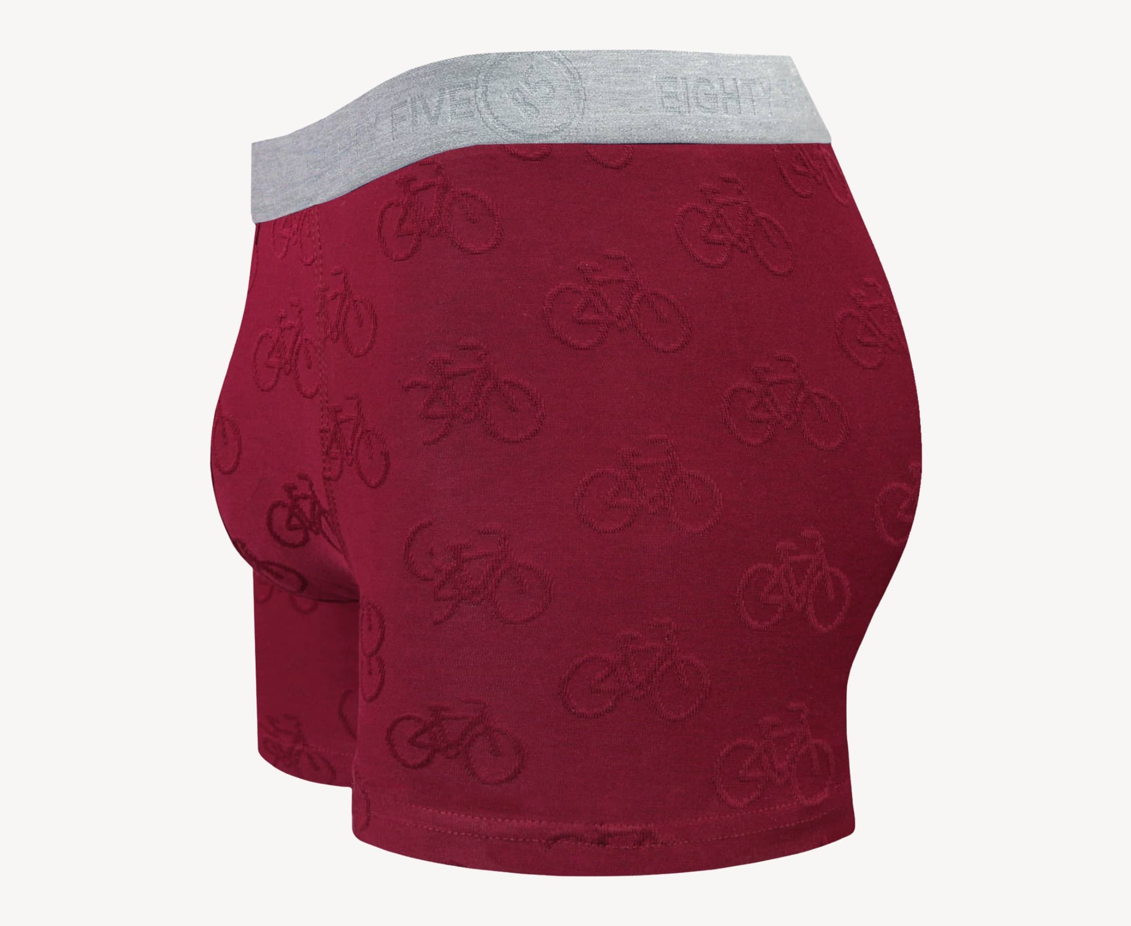 Side view of men’s 95% cotton boxer brief in burgundy with jacquard bicycles pattern, showcasing contoured pouch, and tailored leg cut