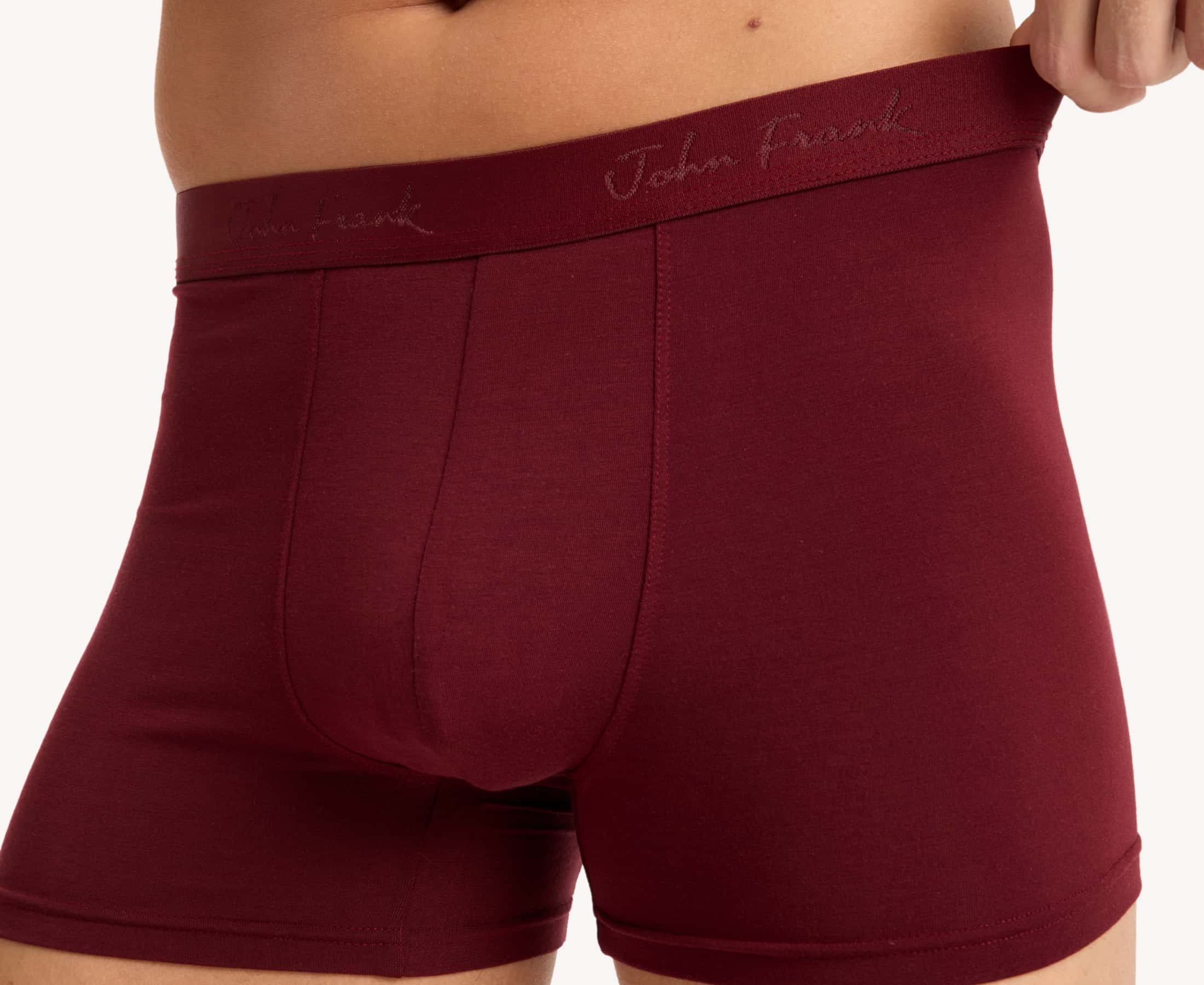 Detail view of bordeaux boxer briefs fabric and waistband with subtle sheen