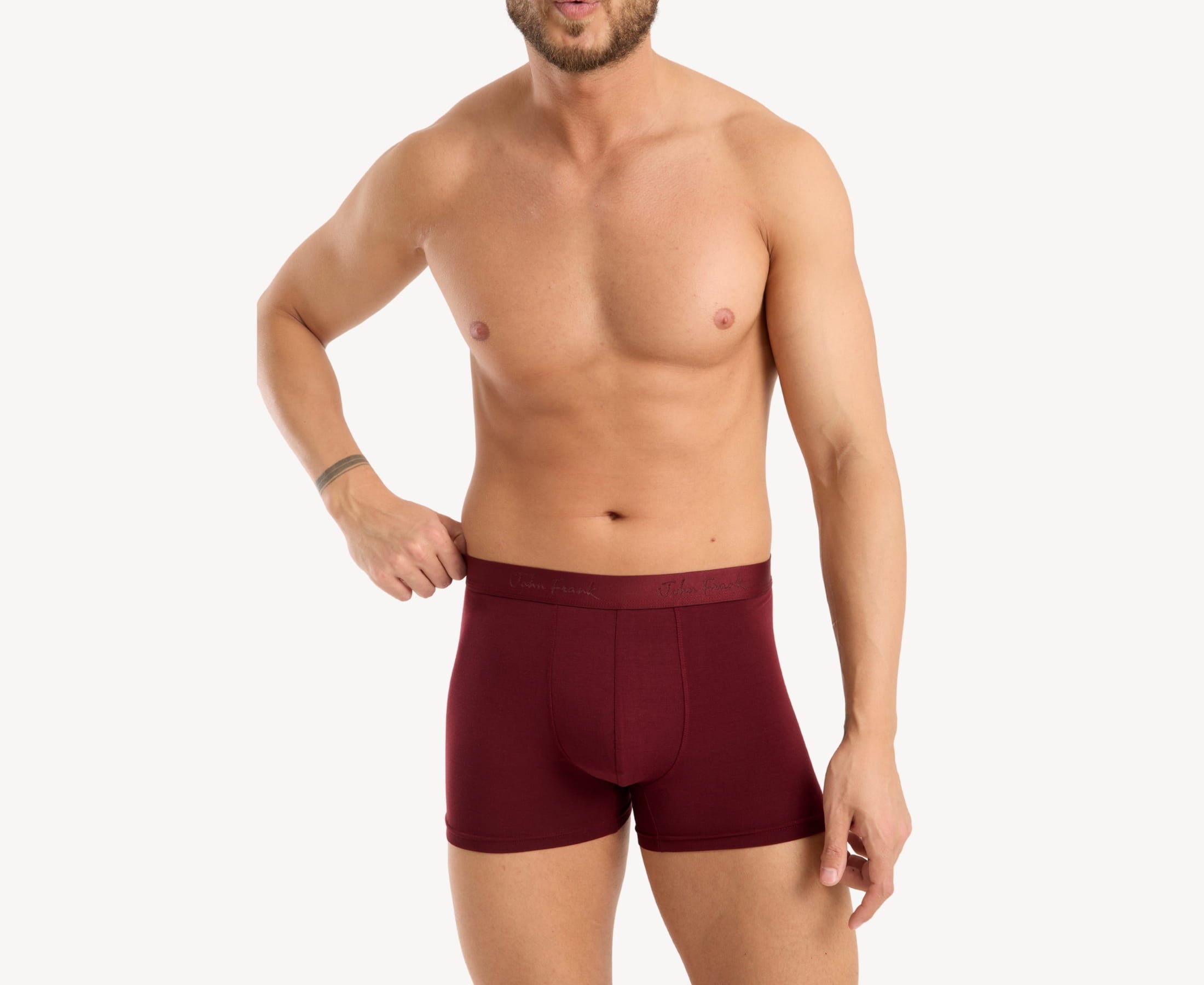 Front view of model wearing men’s 95% micromodal boxer brief in bordeaux with tonal waistband featuring subtle sheen, and soft stretch