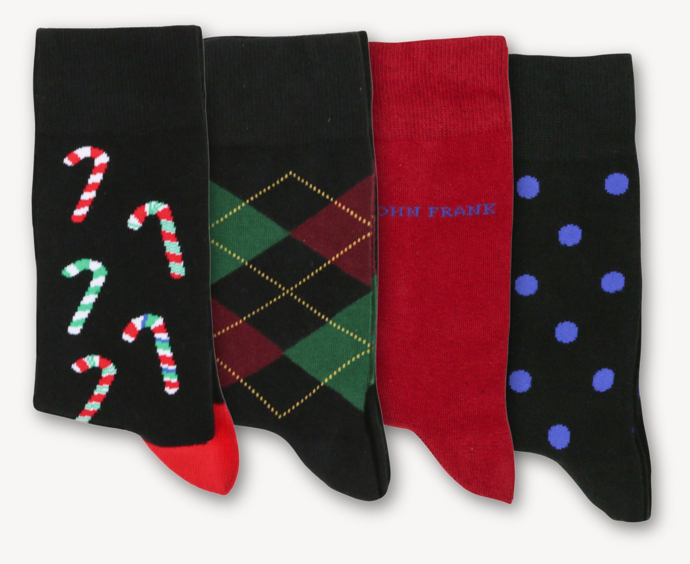 Front view of Holiday Classics 4-pair cotton crew sock set featuring Candy Cane, Argyle, Red Solid, and Frosty Dot designs on a white background